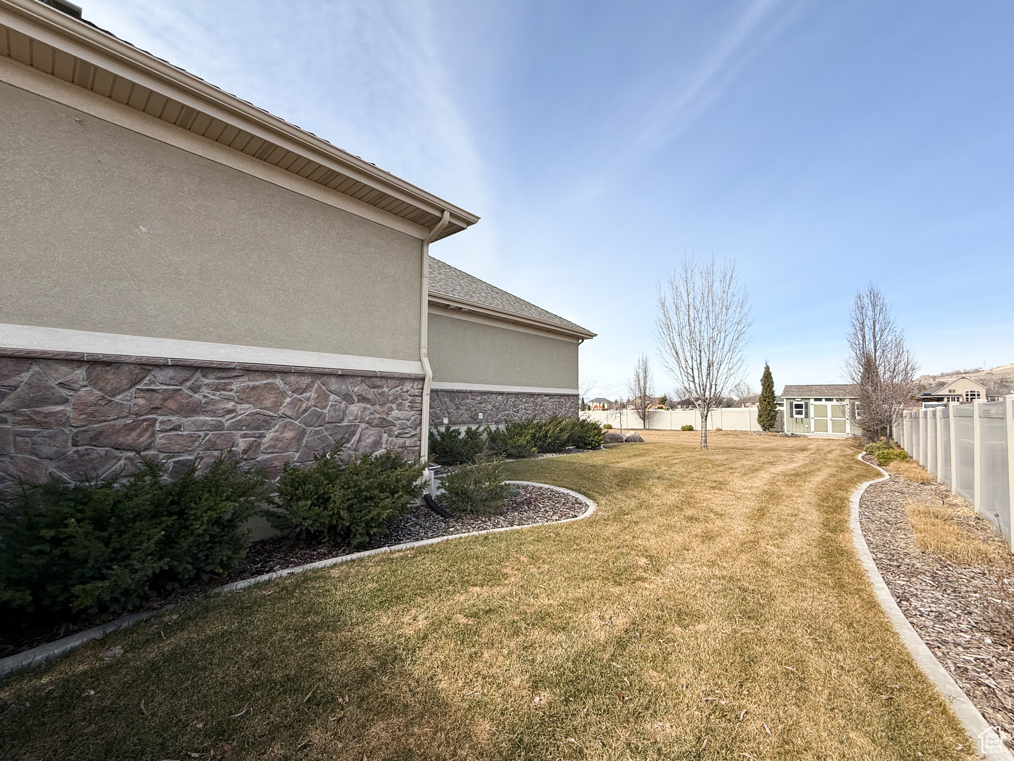 View of yard with fence