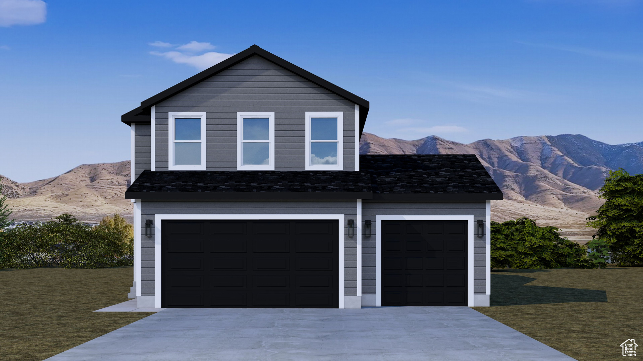 View of front of house featuring a garage, a mountain view, driveway, and a front lawn