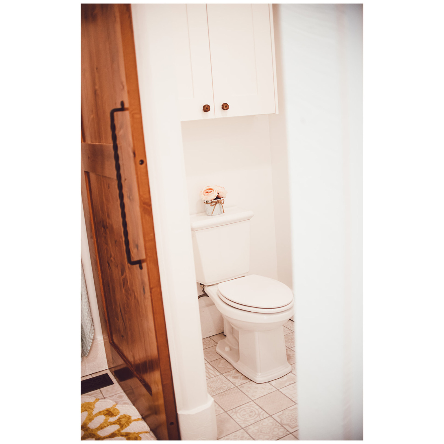 Bathroom with tile patterned flooring and toilet