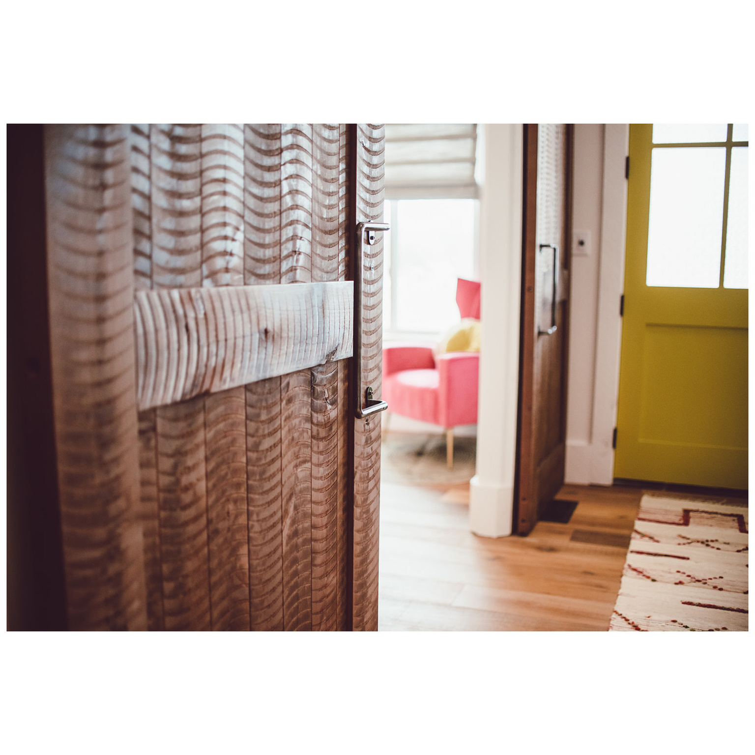 Entryway with light wood-style floors