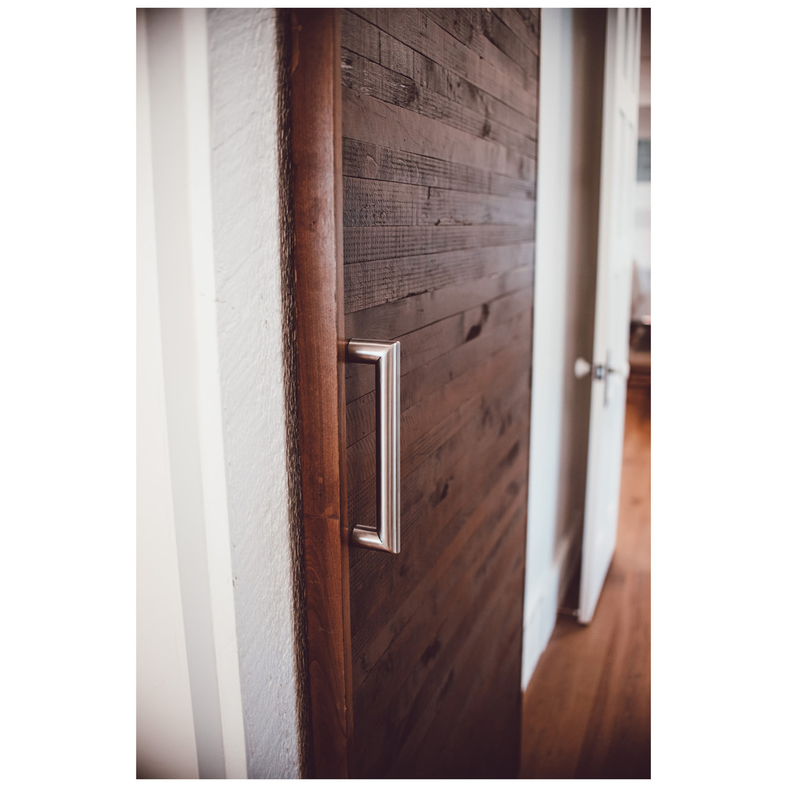 Interior space featuring wood walls