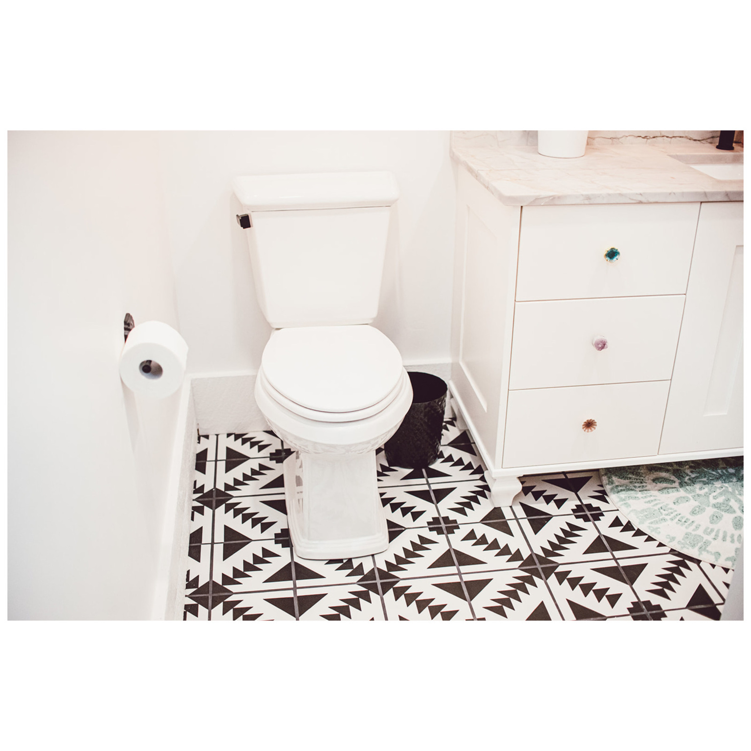 Bathroom with toilet and baseboards