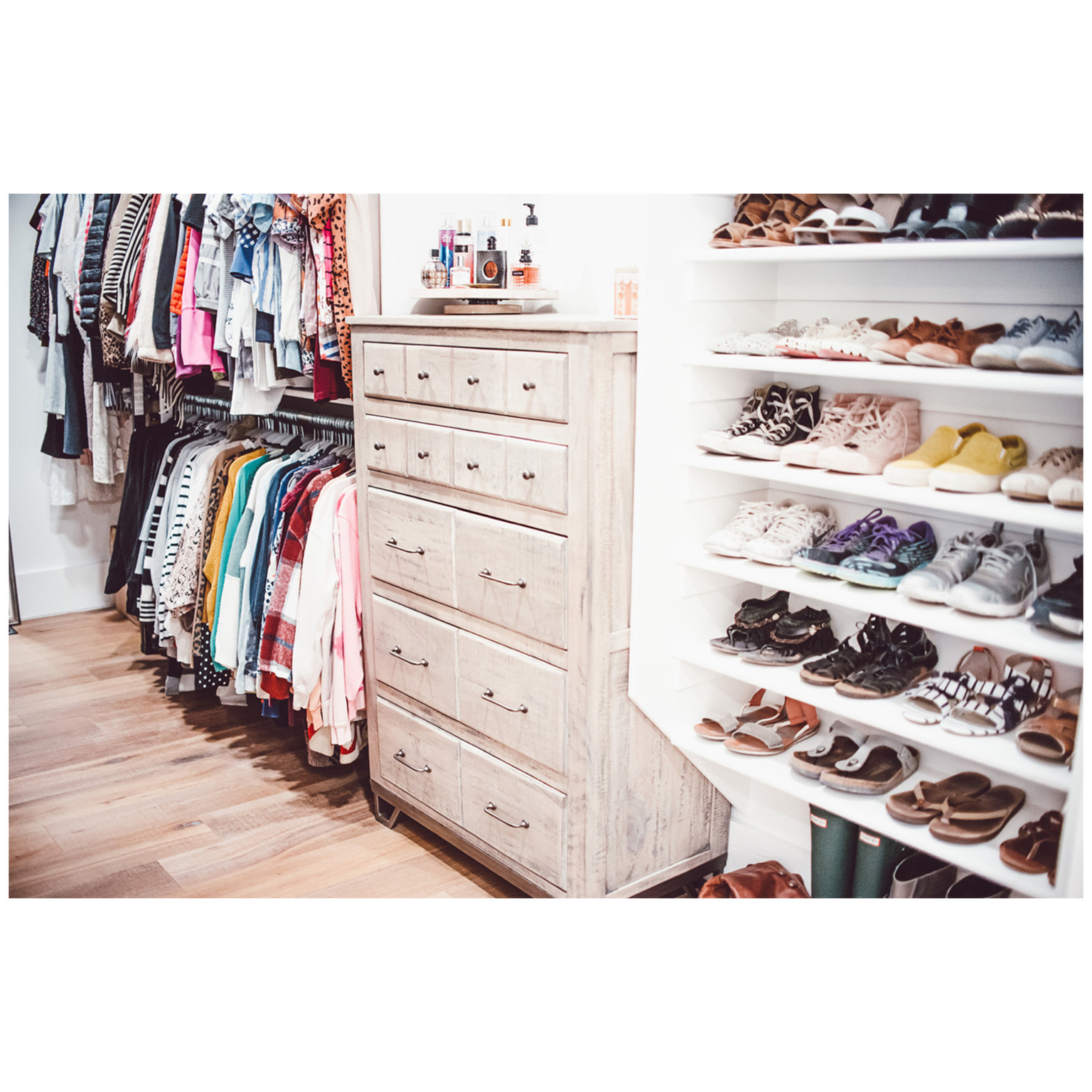 Walk in closet featuring light wood-style floors