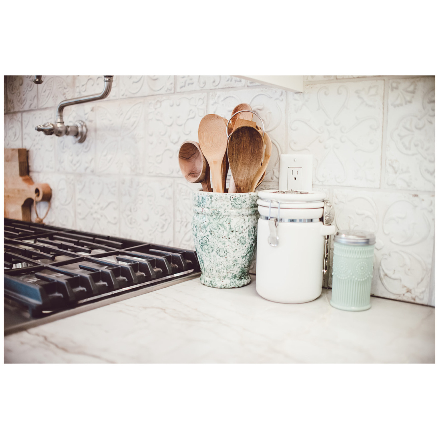 Room details featuring light countertops and stainless steel gas cooktop