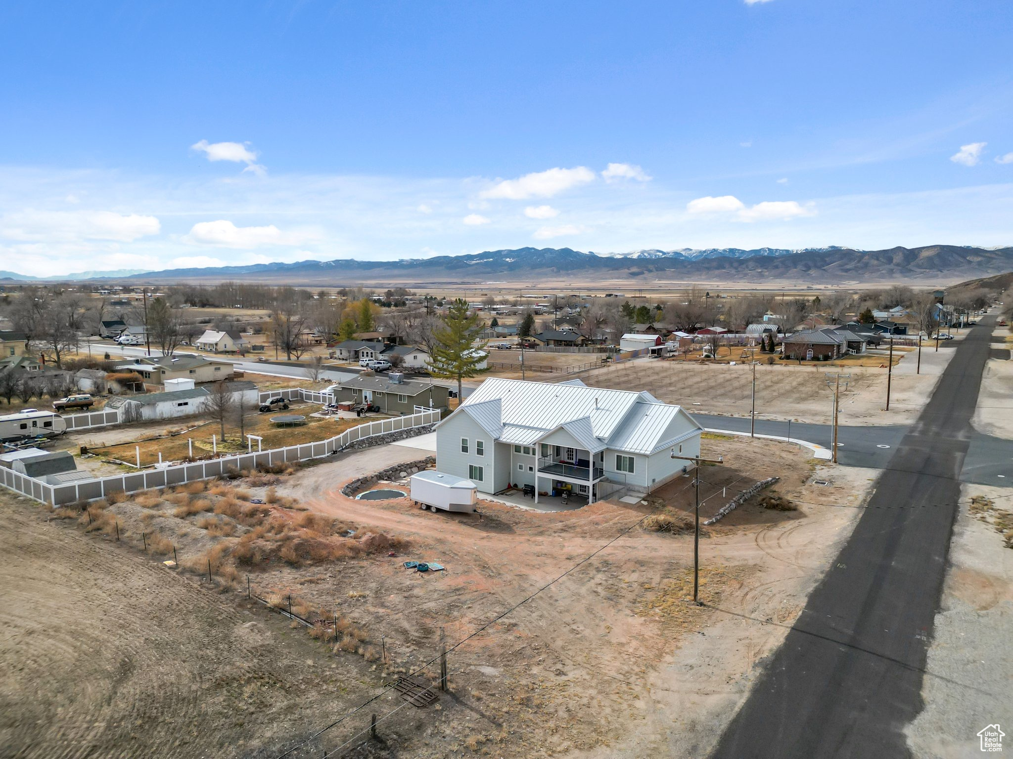 Drone / aerial view featuring a residential view and a mountain view