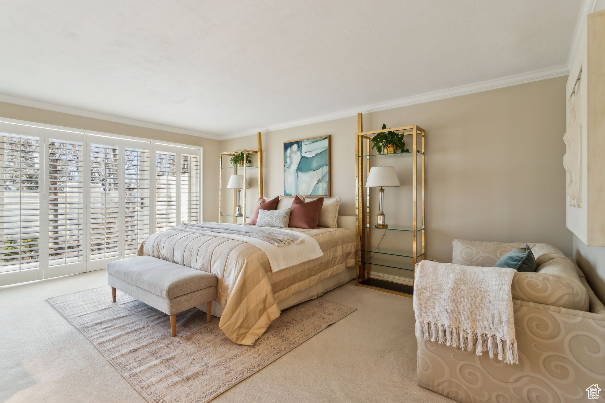 Primary Bedroom with wall of windows and access to back patio