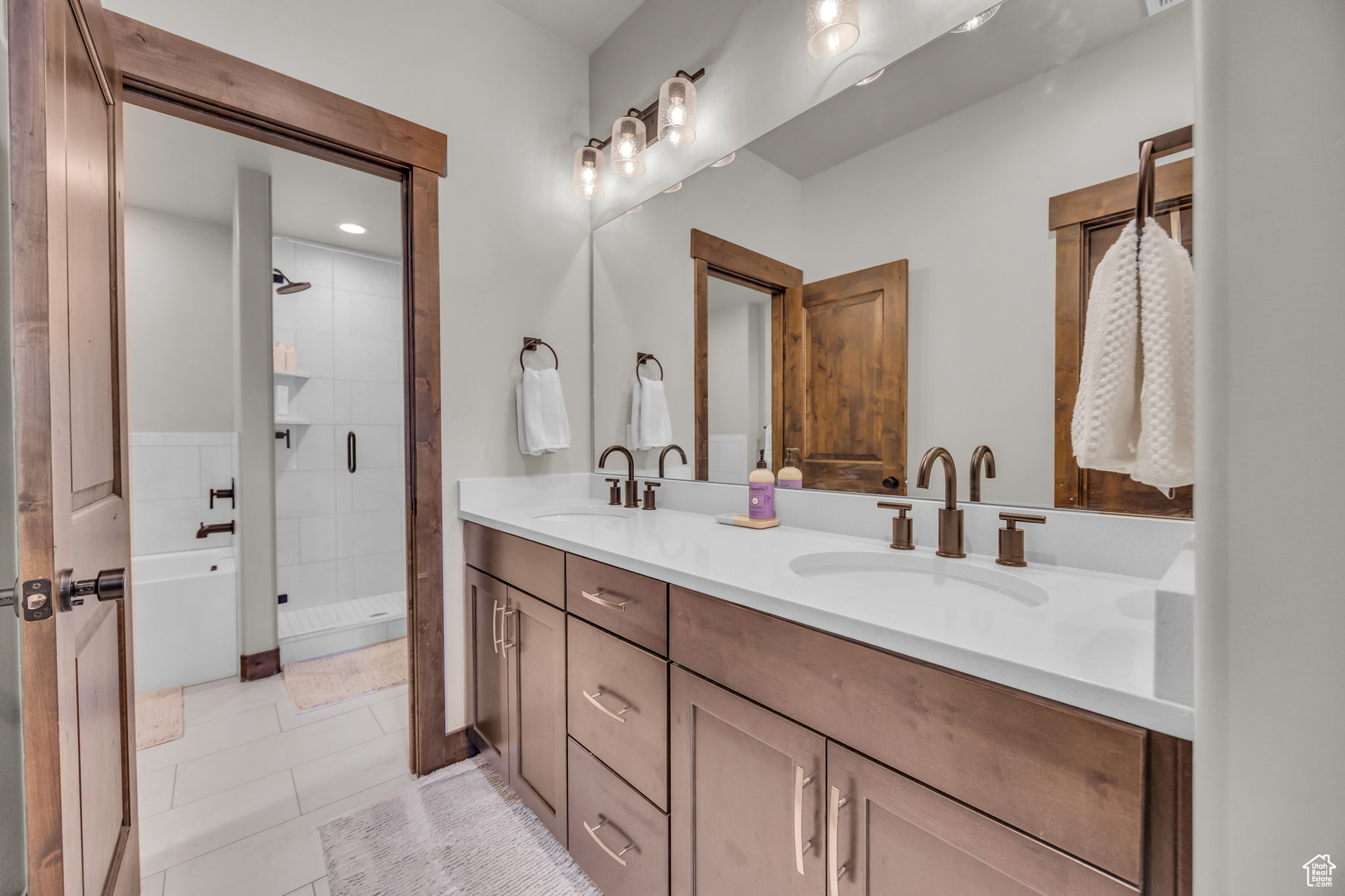 Full bathroom featuring double vanity