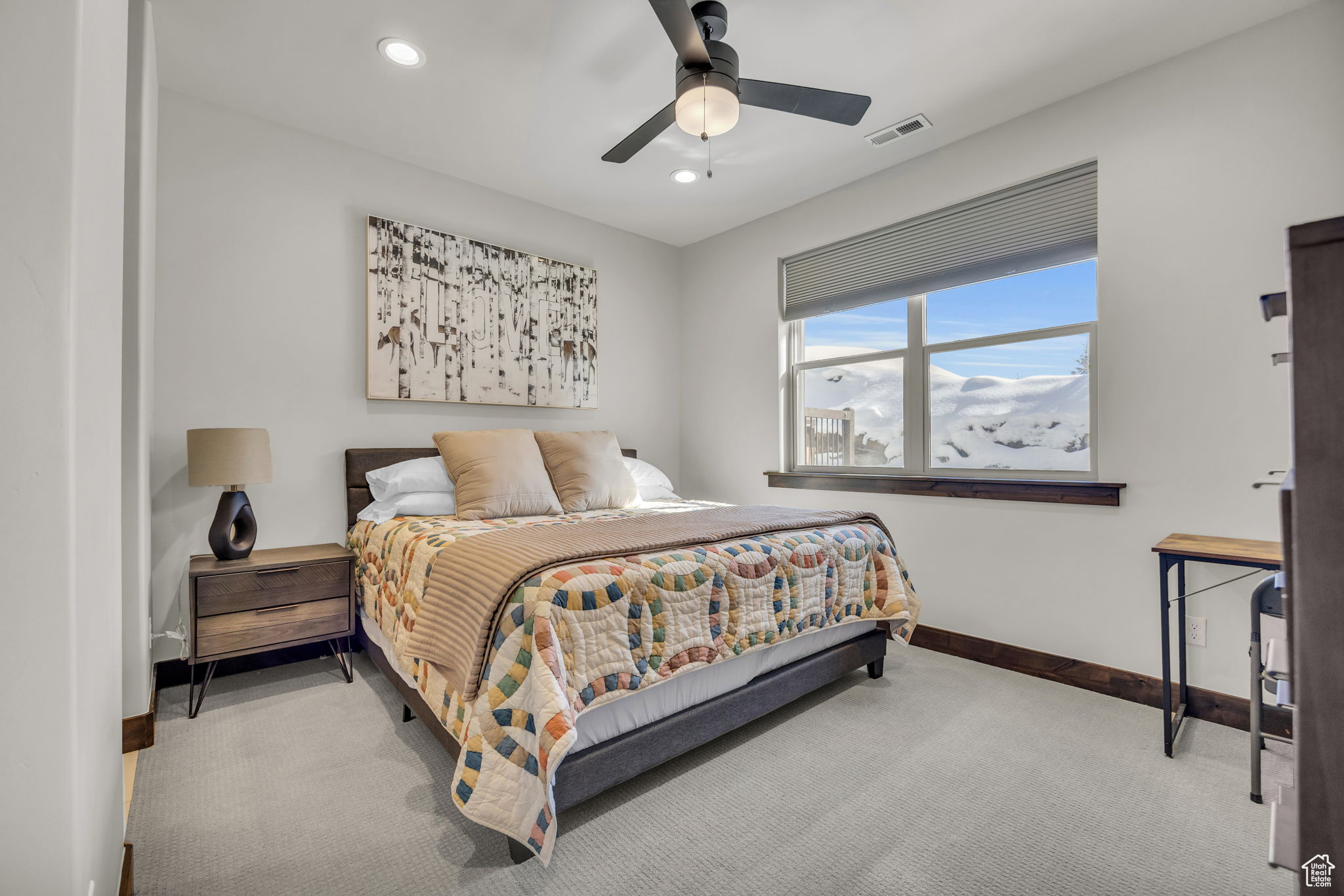 Carpeted bedroom with baseboards, visible vents, a ceiling fan, and recessed lighting