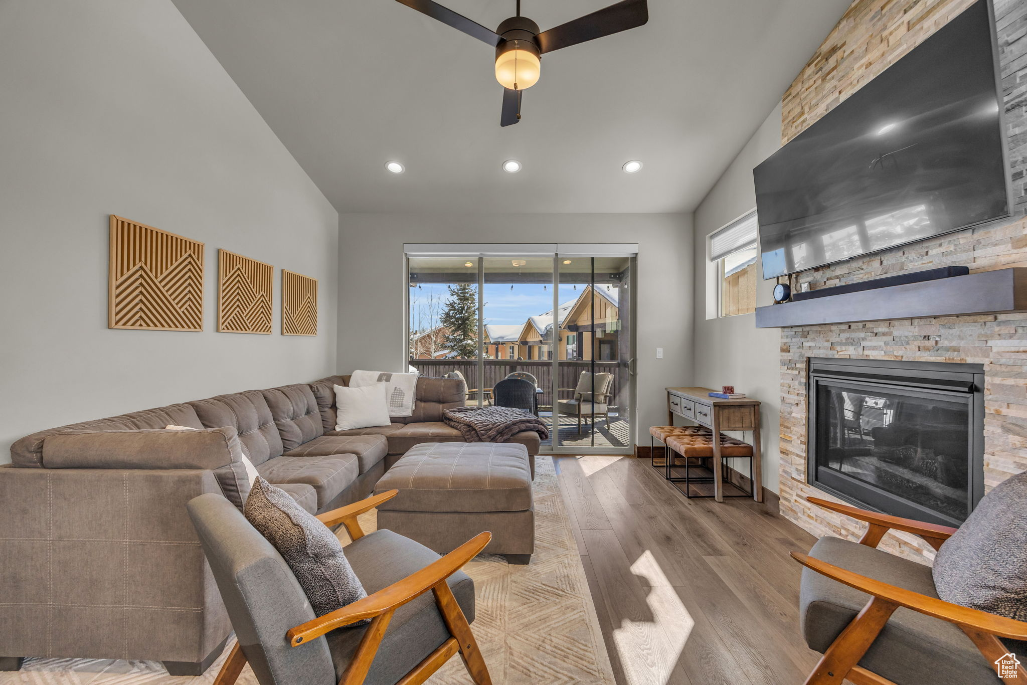 Living room with fireplace and access to balcony