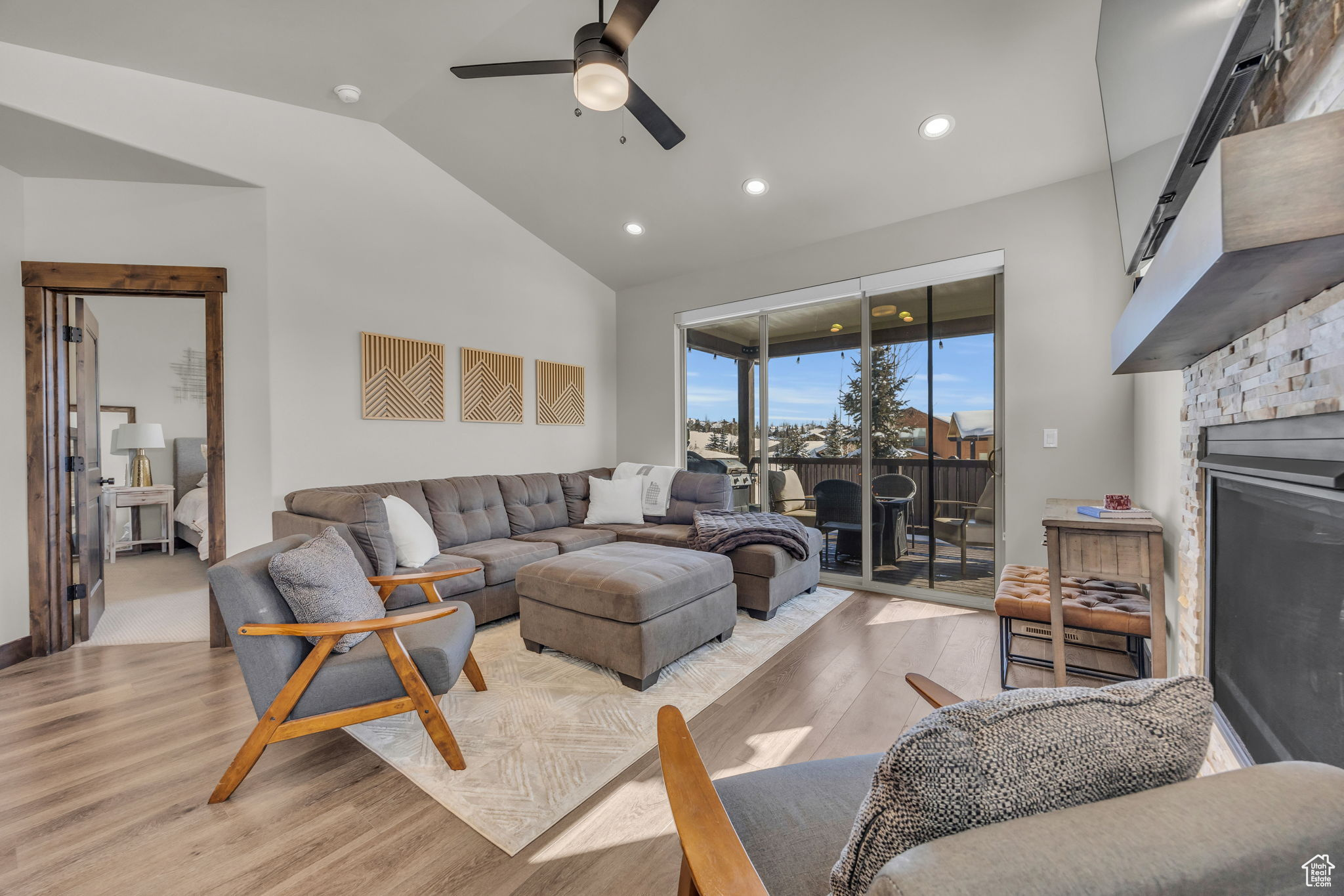 Living room with fireplace and access to balcony