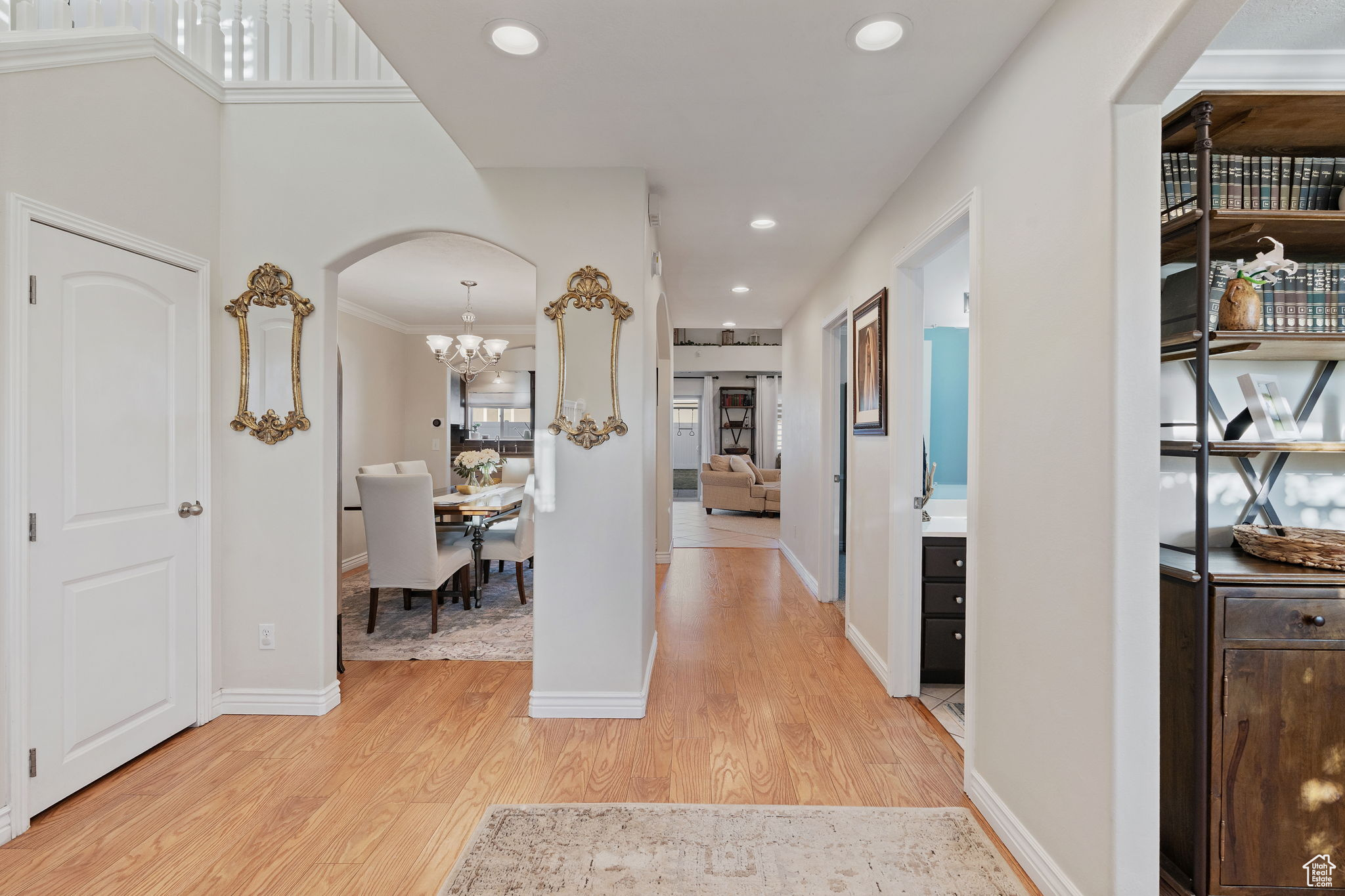 Entryway. Formal dining to the left. Formal living room to the right. Main level full bathroom to the right.