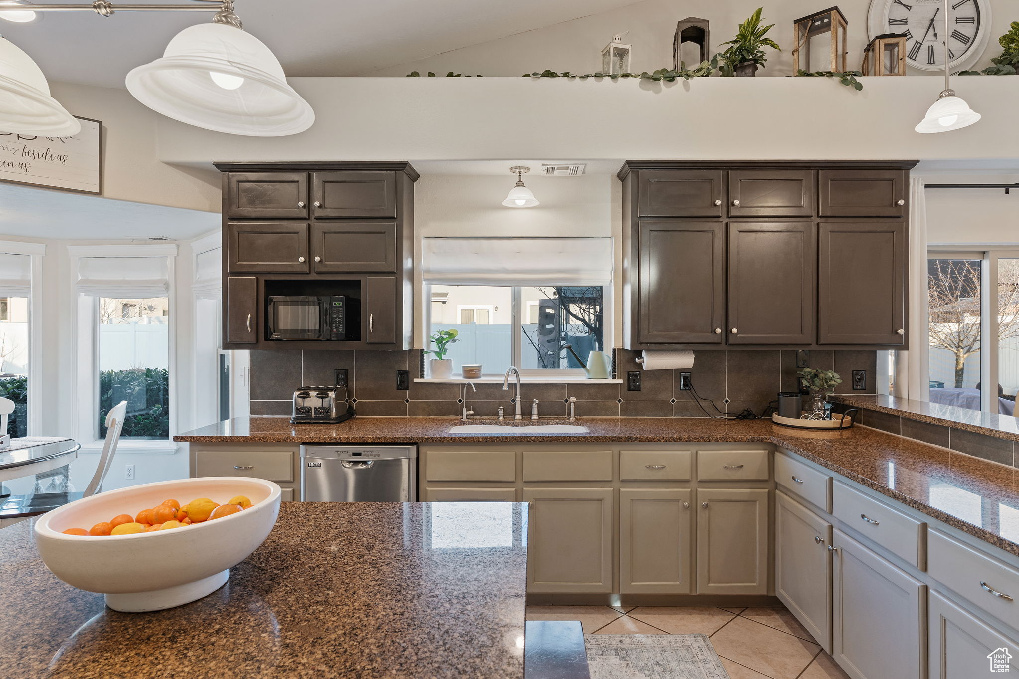 Gorgeous and spacious kitchen. Great for entertaining. Gas Stove. Double Oven. Can Lighting. High bar for informal eating. Island for prep and serving. Pantry. Abundant Cabinetry.