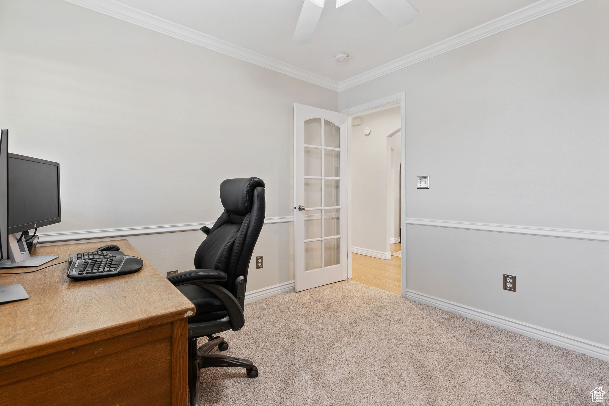 Main level bedroom featuring new carpet and new paint, doubles as an office, guest bedroom, game room, craft room, etc.