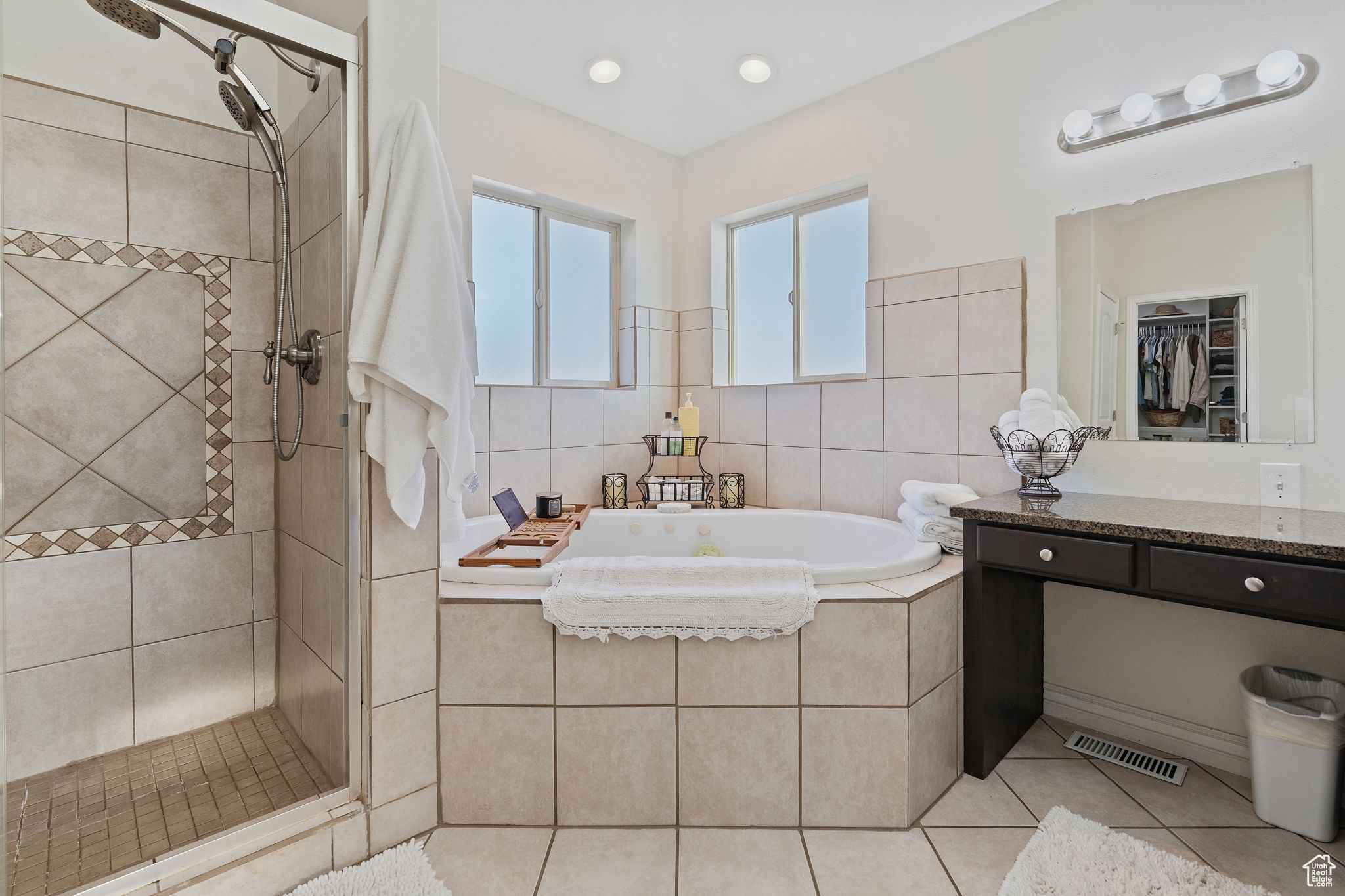 Primary Suite. Featuring separate tub, shower, his/her sinks.