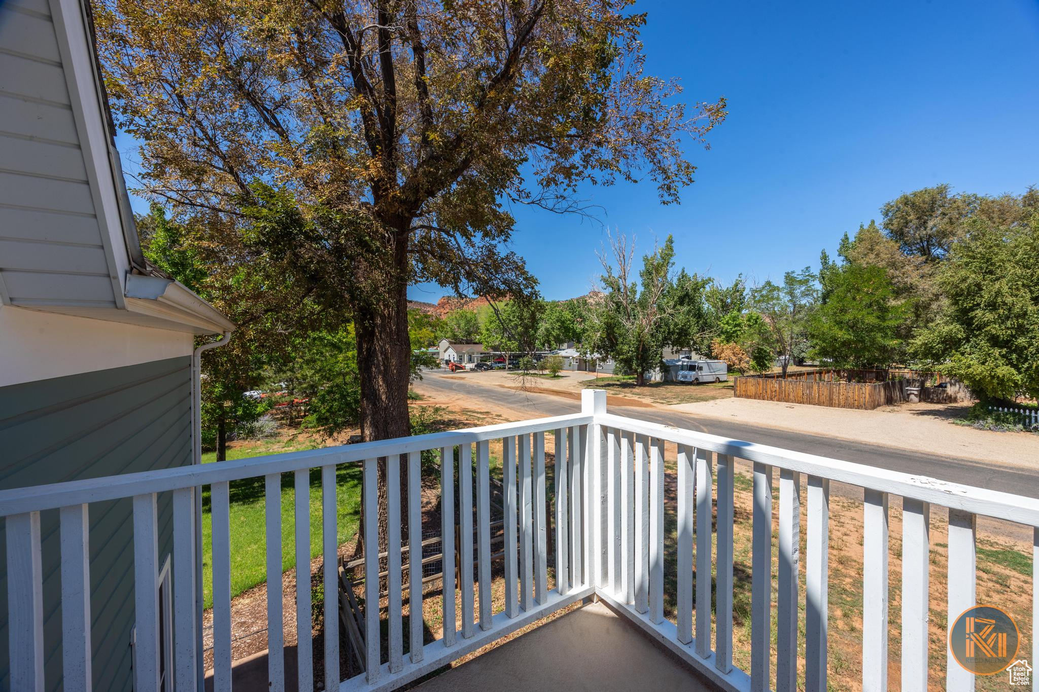 Balcony featuring covered porch