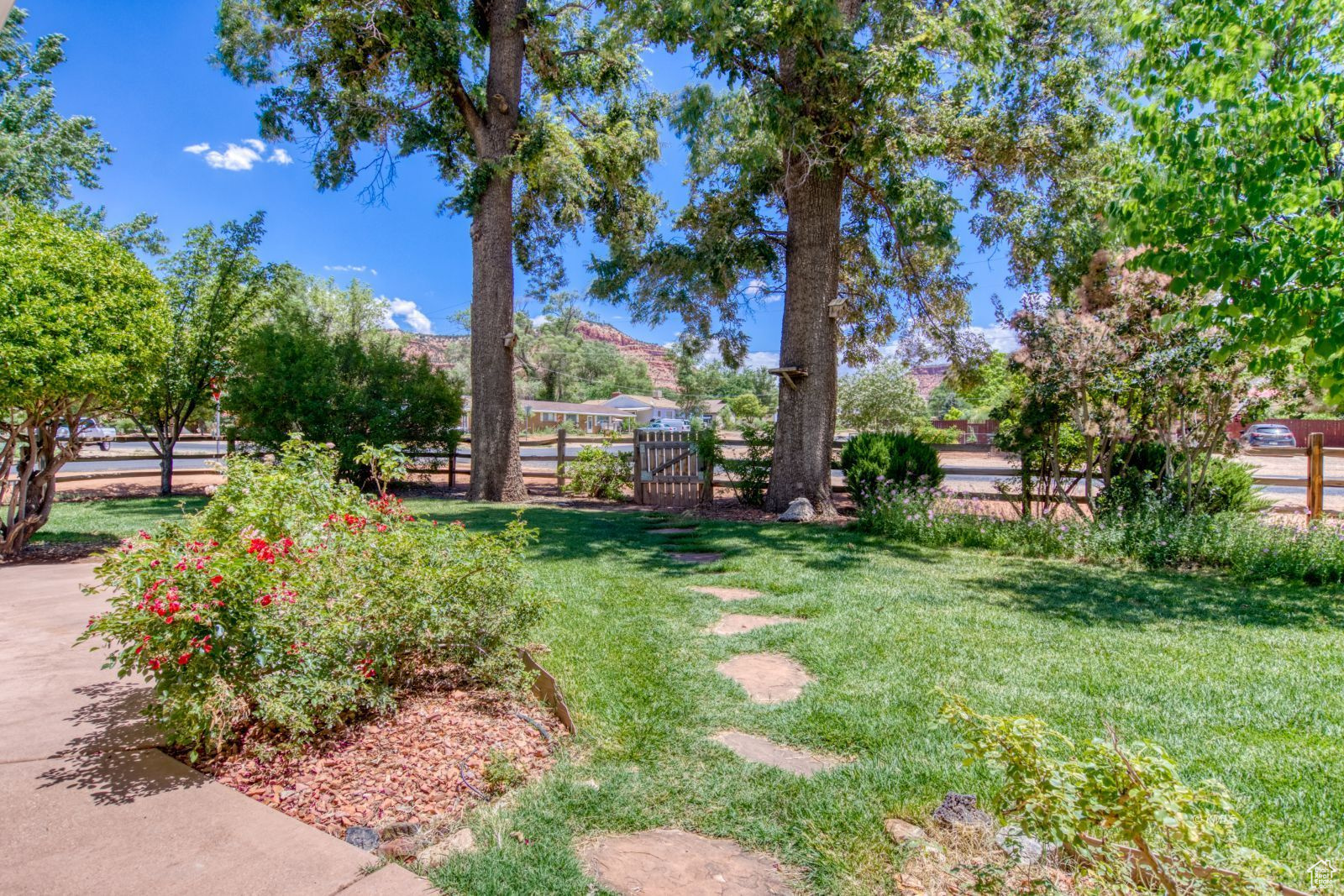 View of yard featuring fence
