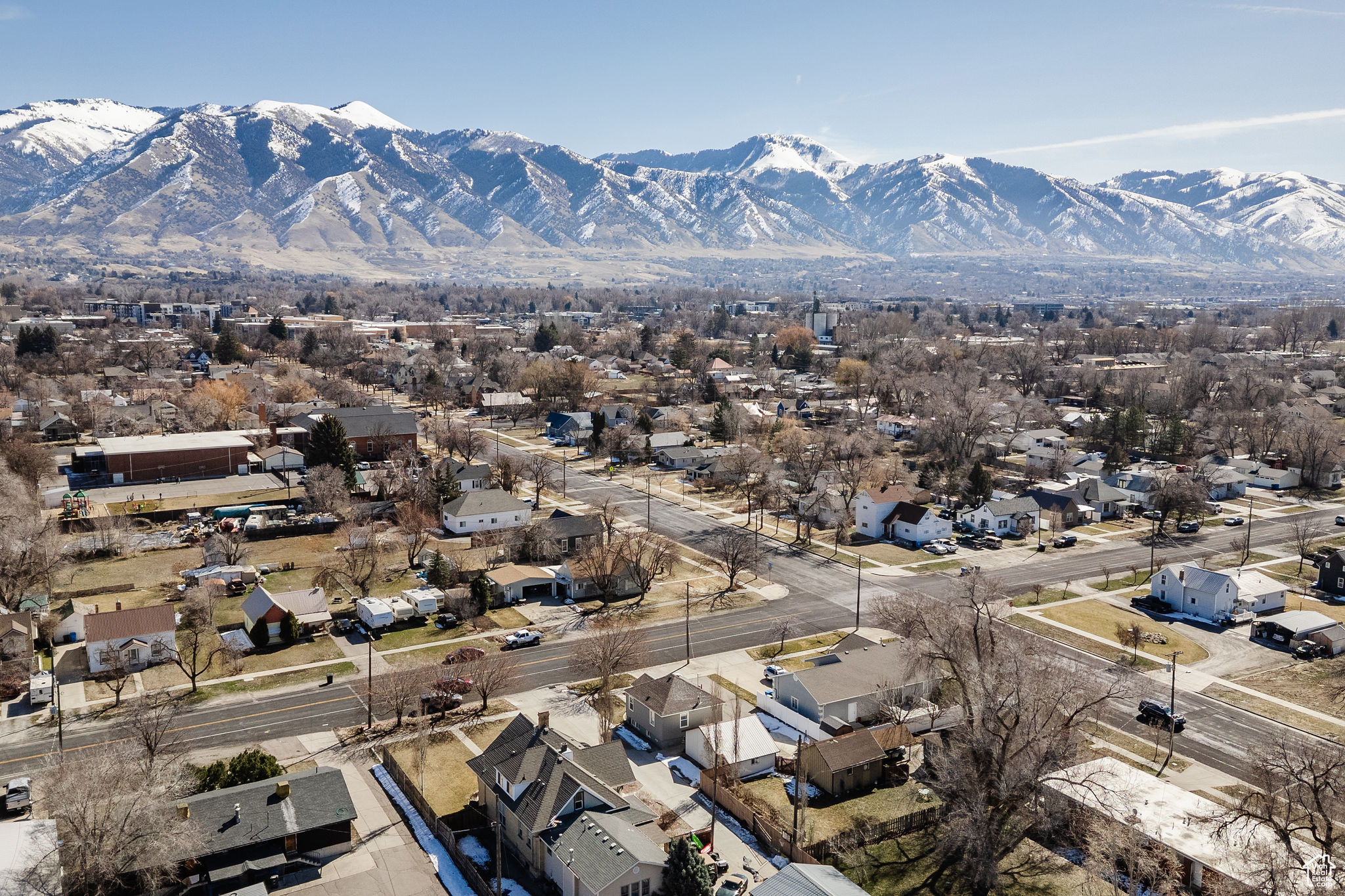 Aerial view featuring a mountain view and a residential view