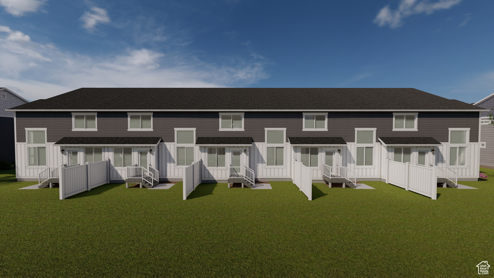 Rear view of property with a yard and a wooden deck