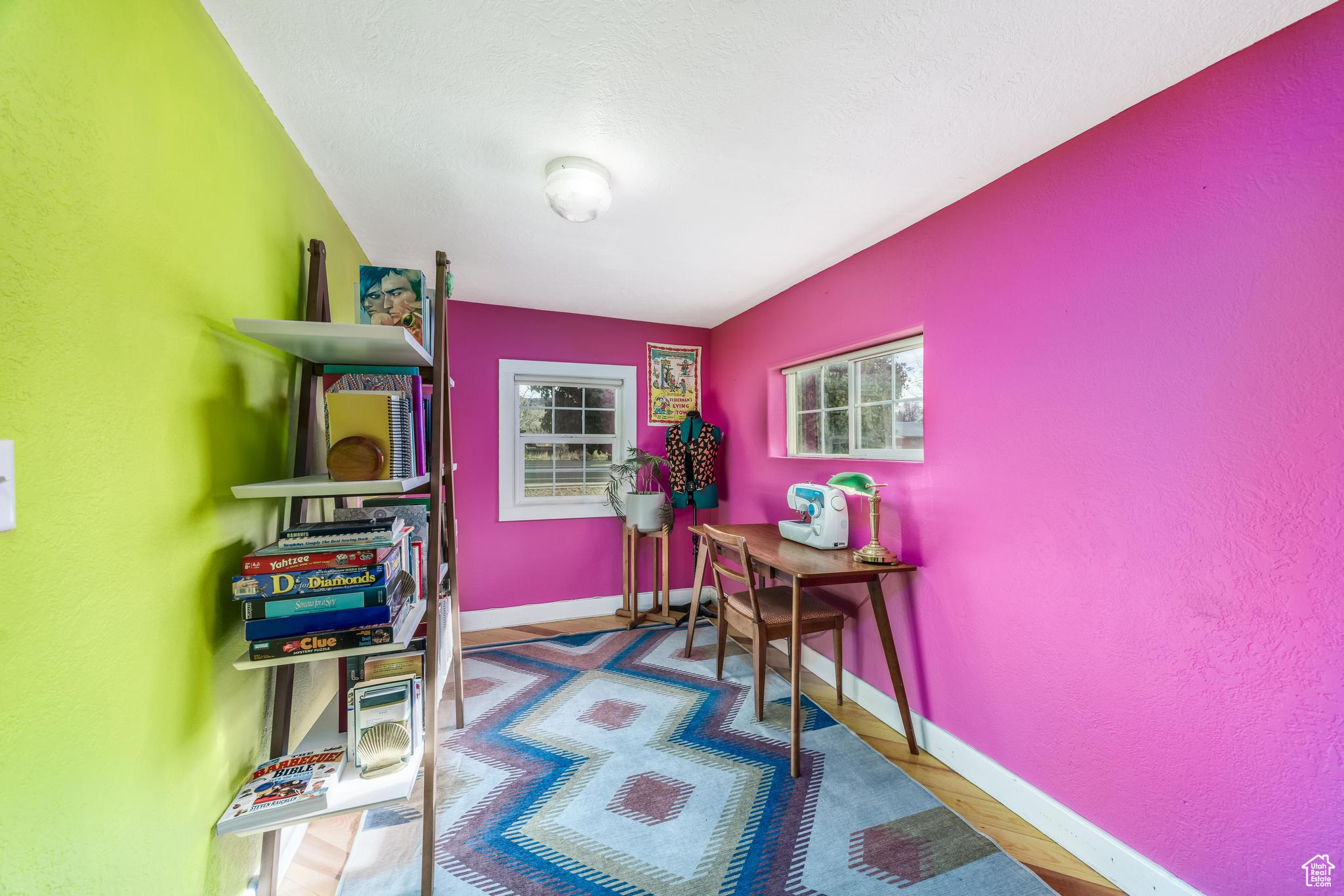 Office featuring wood finished floors and baseboards