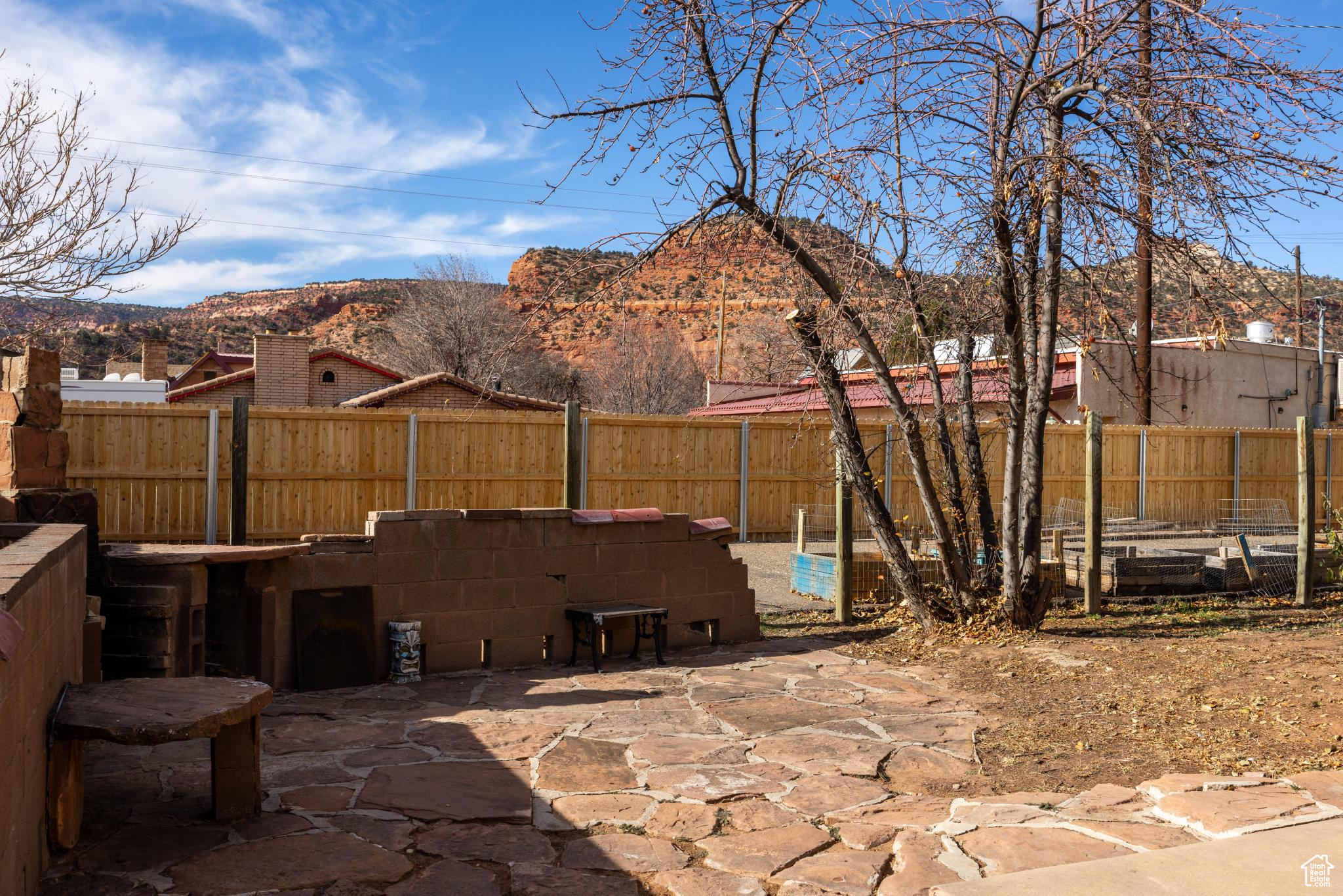 View of patio / terrace with a fenced backyard and a mountain view