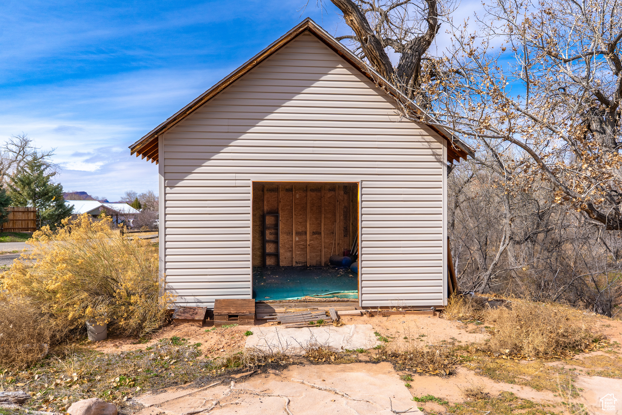 View of outbuilding with an outdoor structure