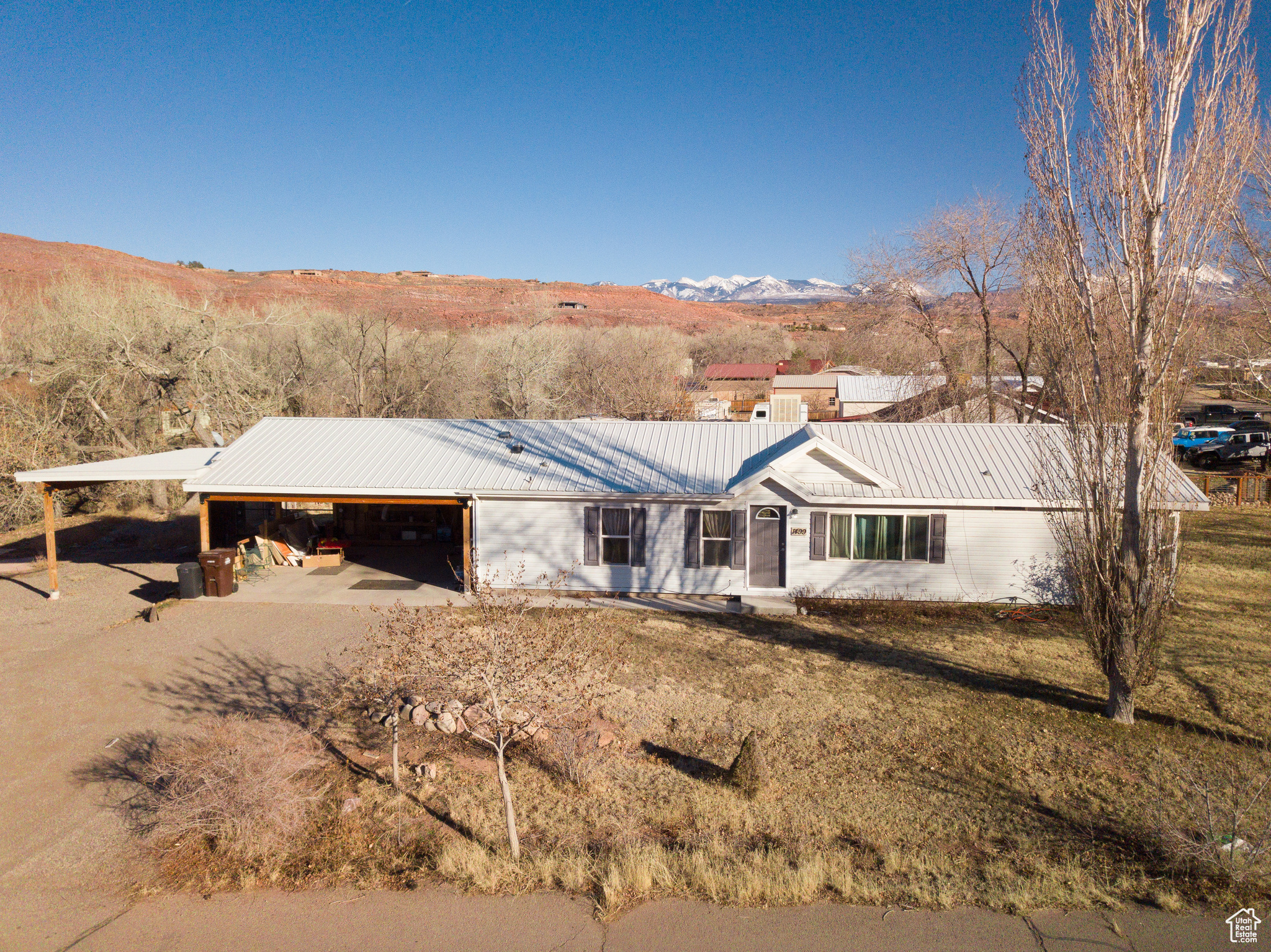 Single story home featuring a mountain view