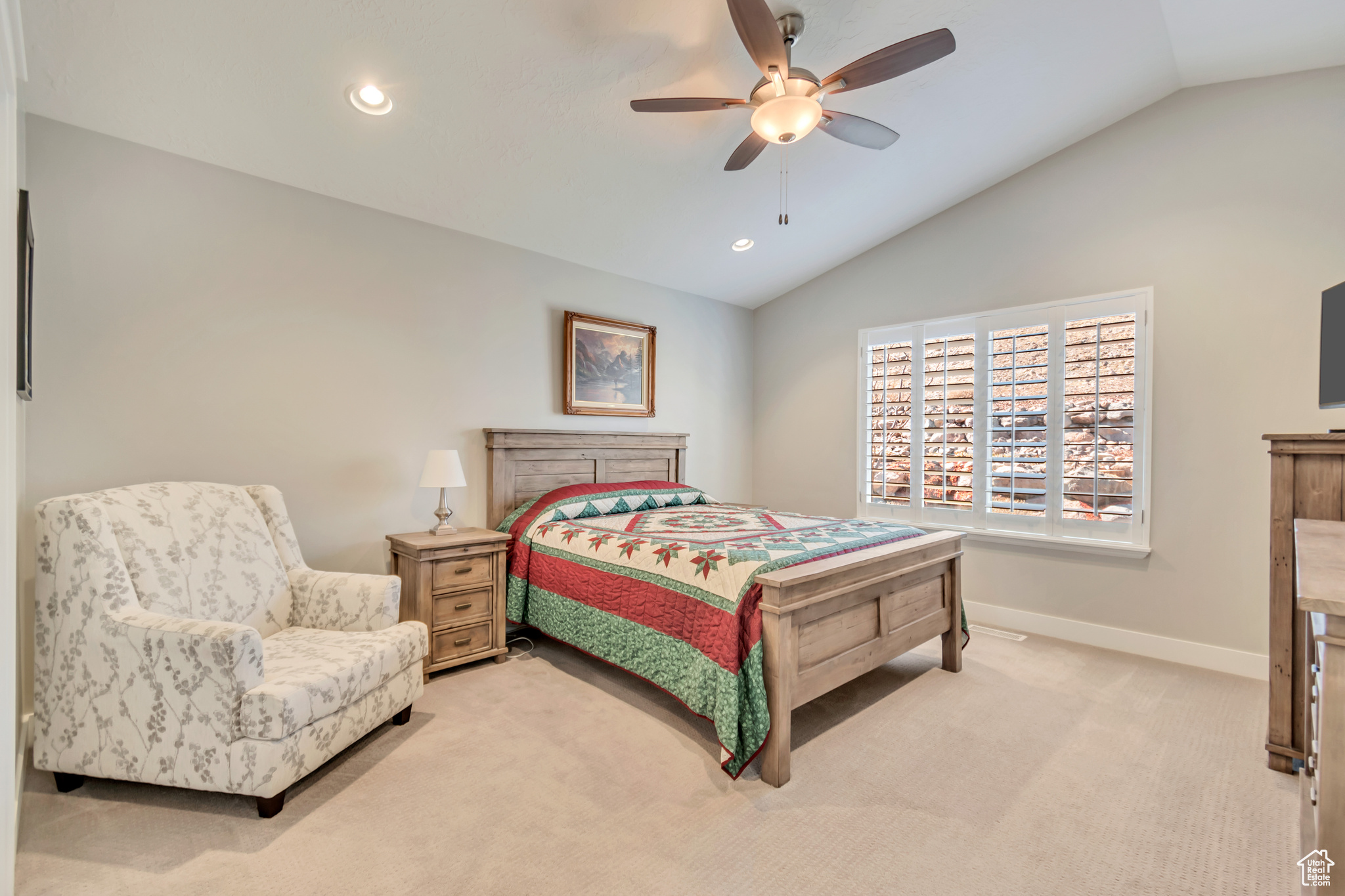 Master bedroom with vaulted ceilings, walk-in closet and ensuite bathroom