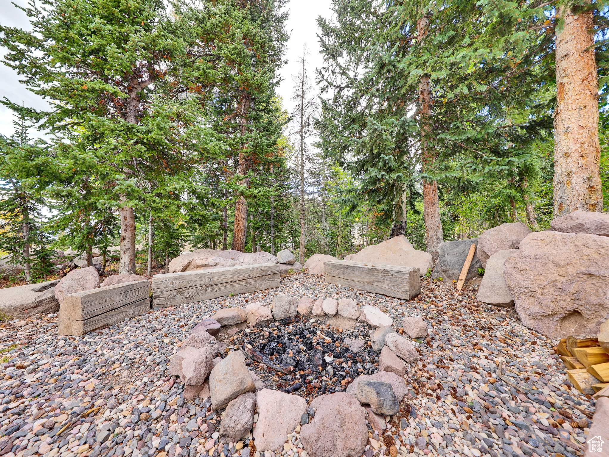 View of yard with an outdoor fire pit