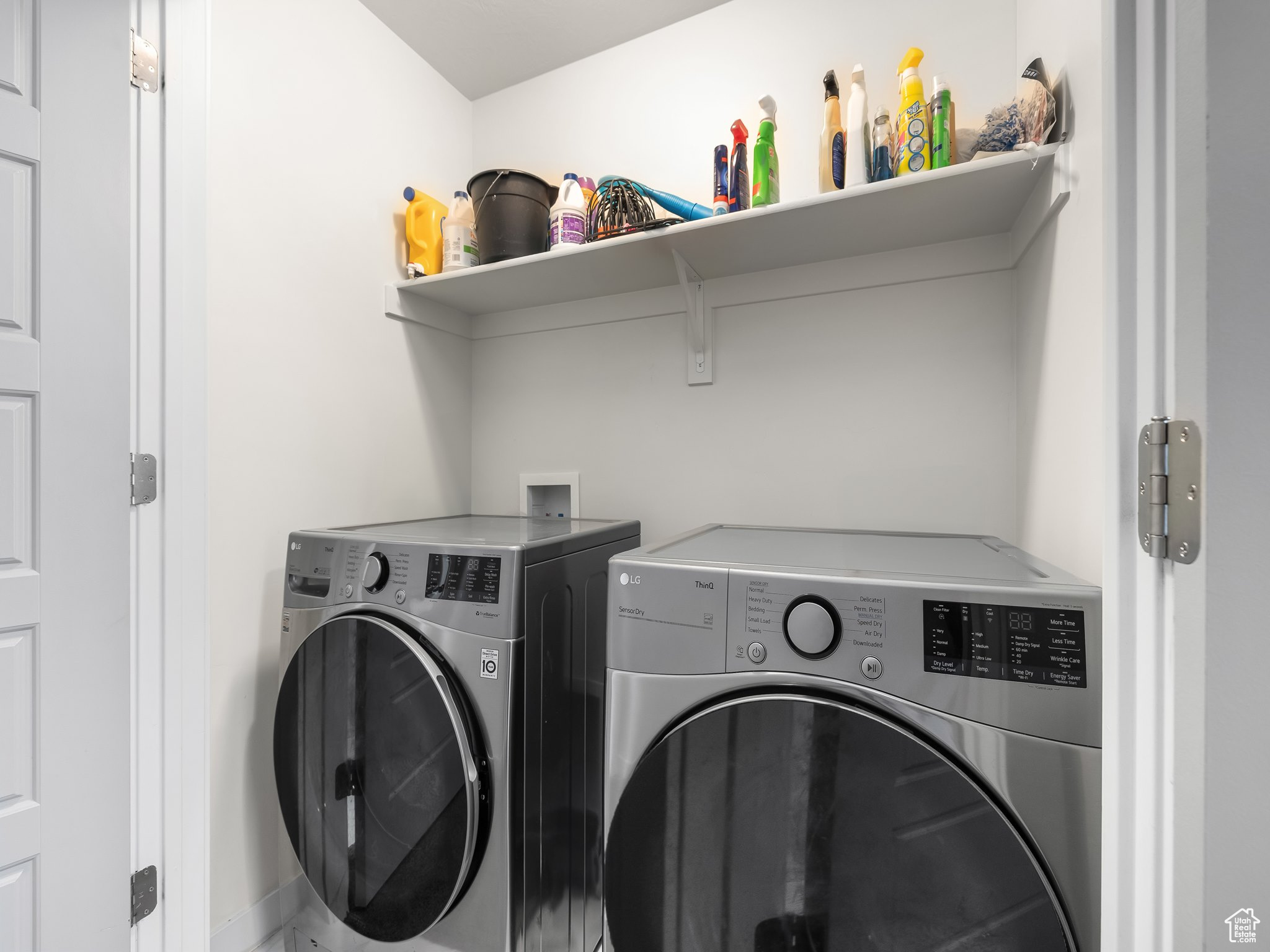 Laundry area featuring laundry area and independent washer and dryer