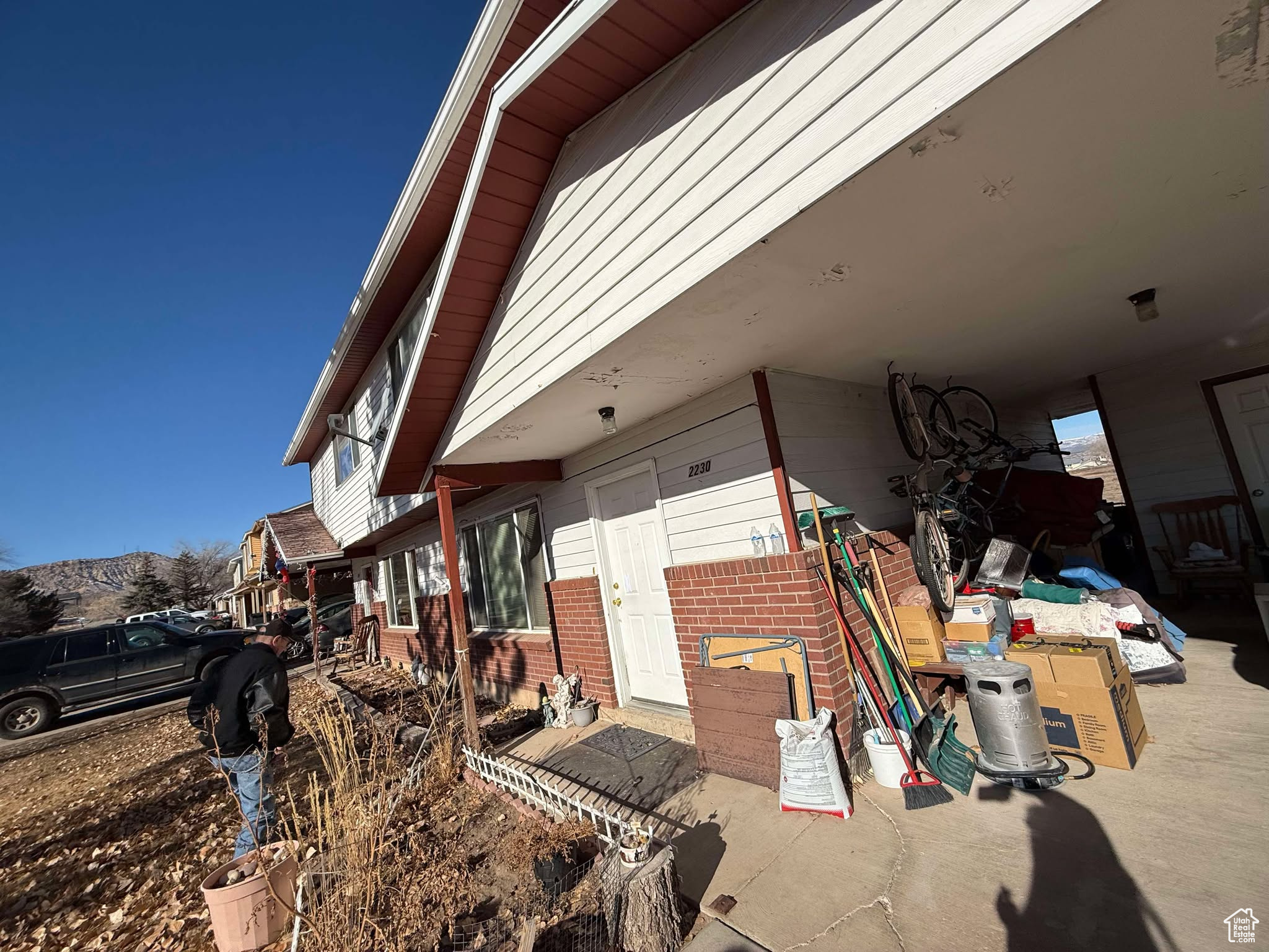 View of side of property with brick siding