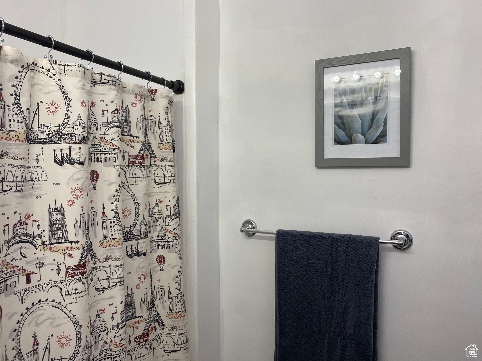 Bathroom featuring a shower with curtain