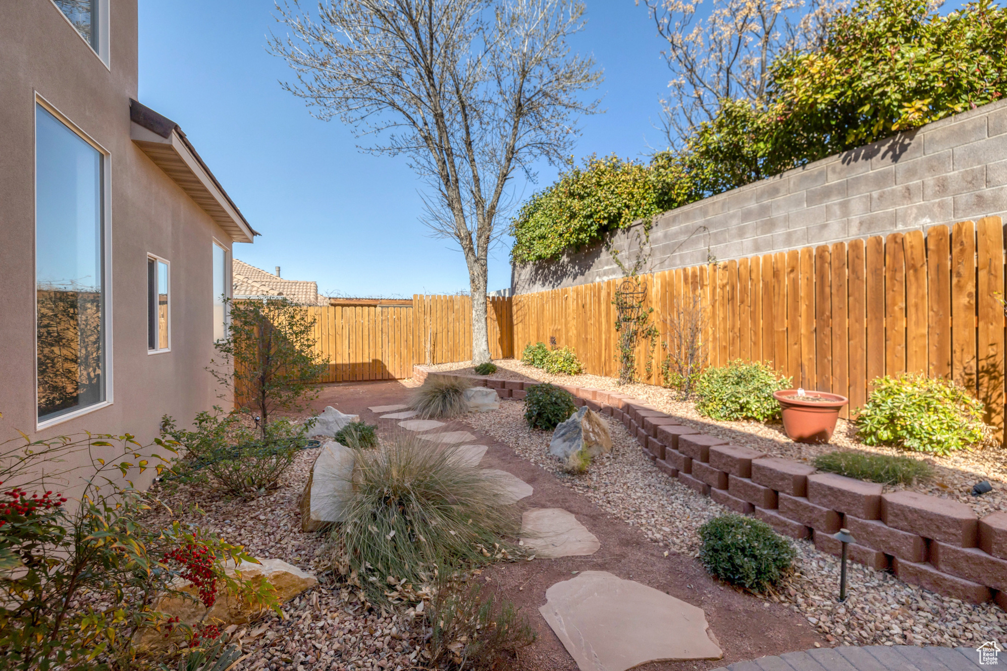 View of yard featuring a fenced backyard