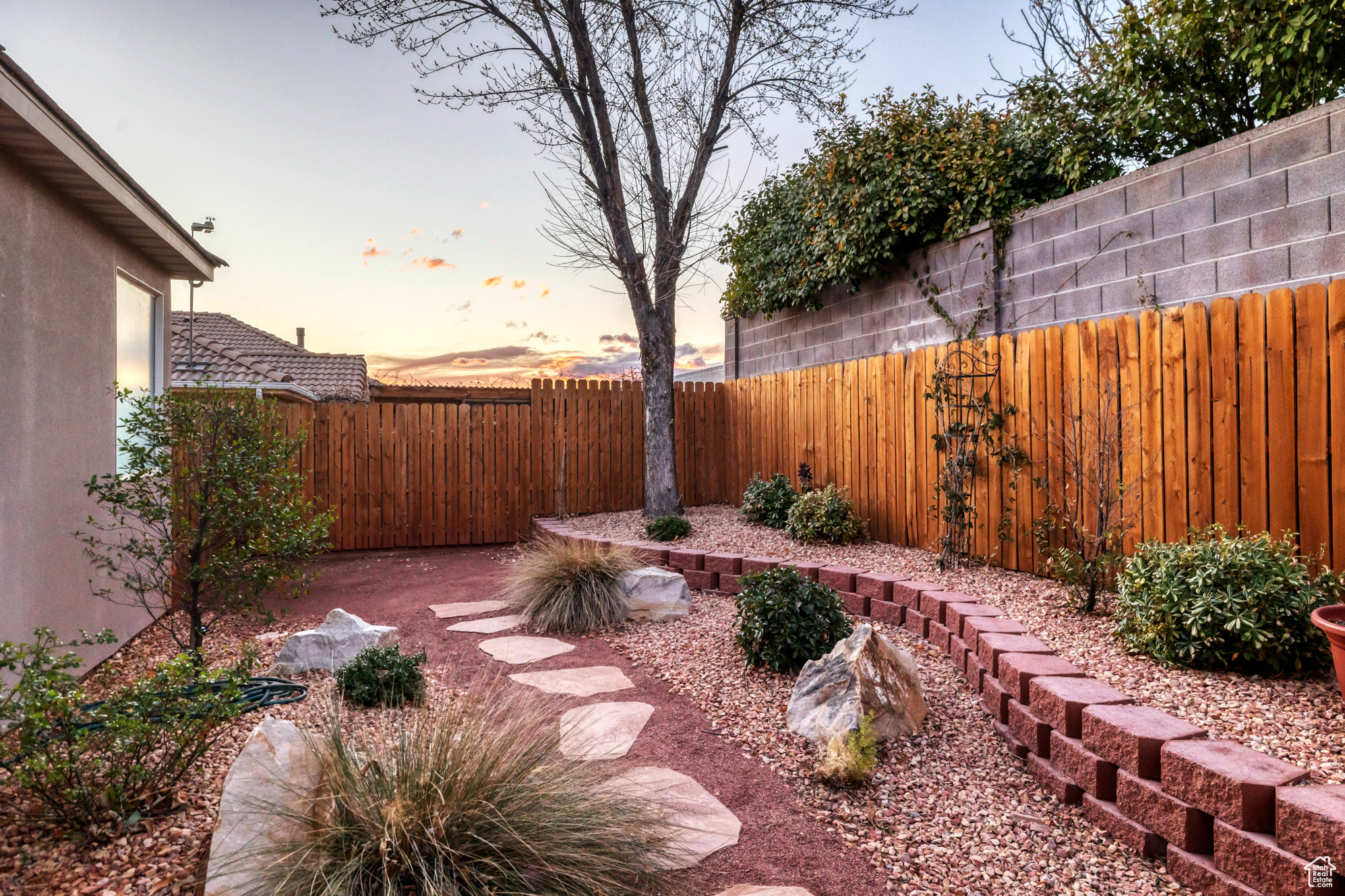 View of yard with a fenced backyard