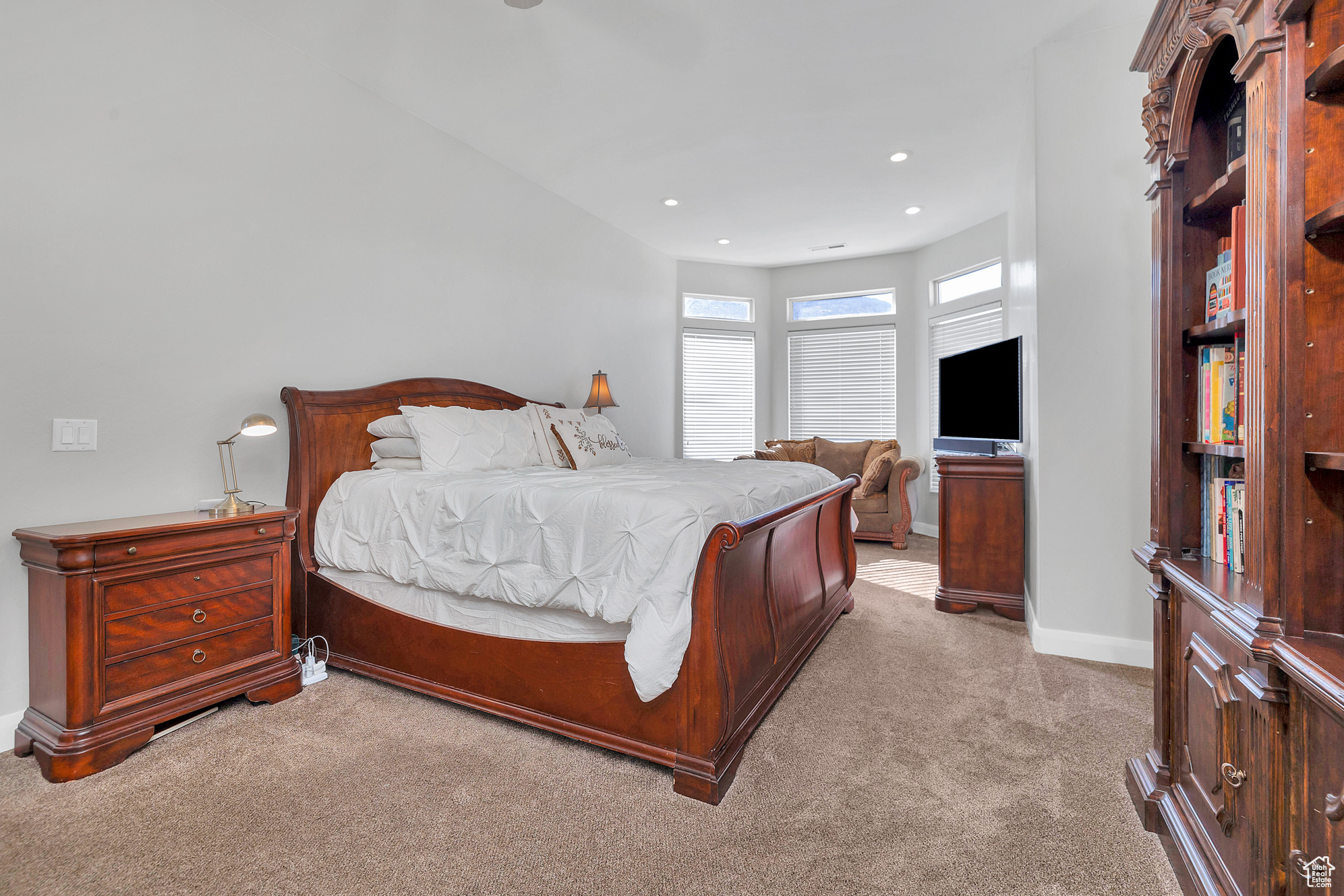 Bedroom featuring recessed lighting, baseboards, and carpet floors