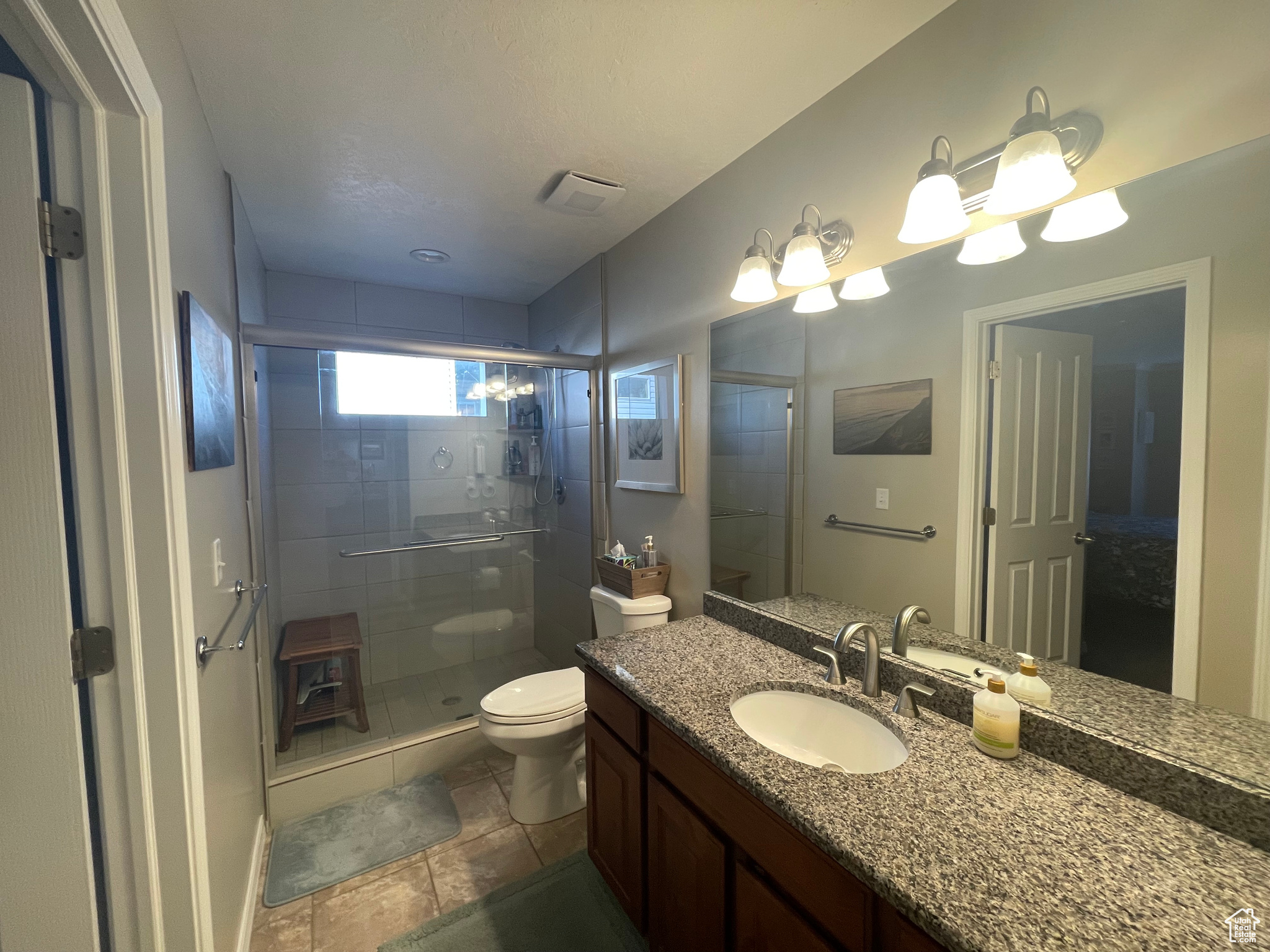 Main Bathroom with an oversized upgraded shower and vanity