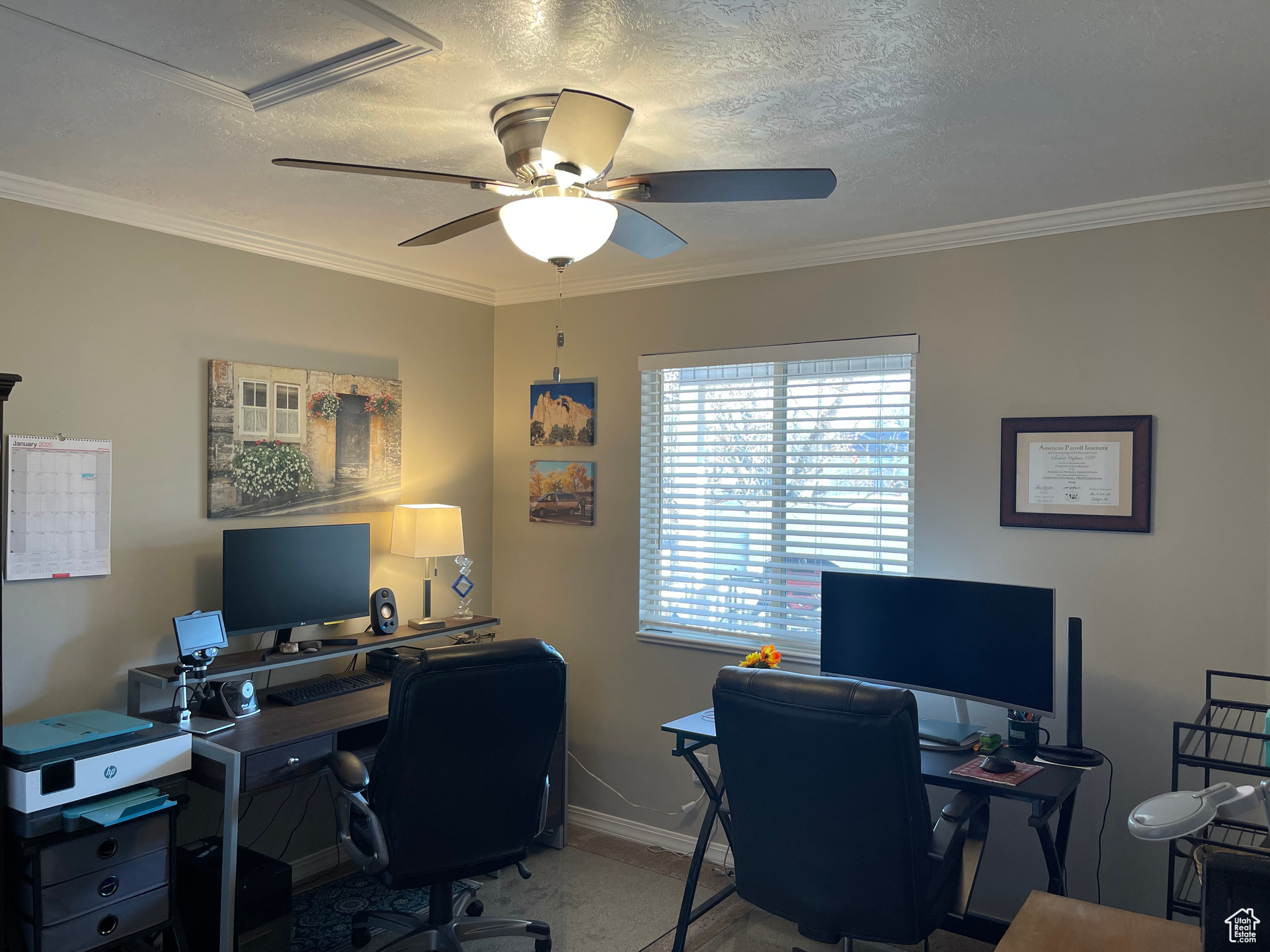 Office/2nd bedroom featuring ceiling fan,  textured ceiling, and mountain view