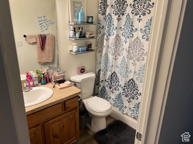 Bathroom with toilet and vanity
