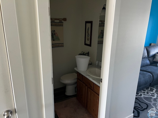 Bathroom featuring toilet and vanity