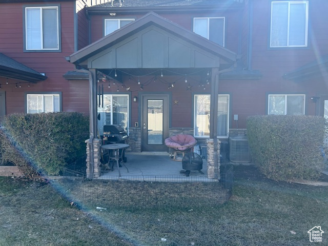 Entrance to property featuring a patio area