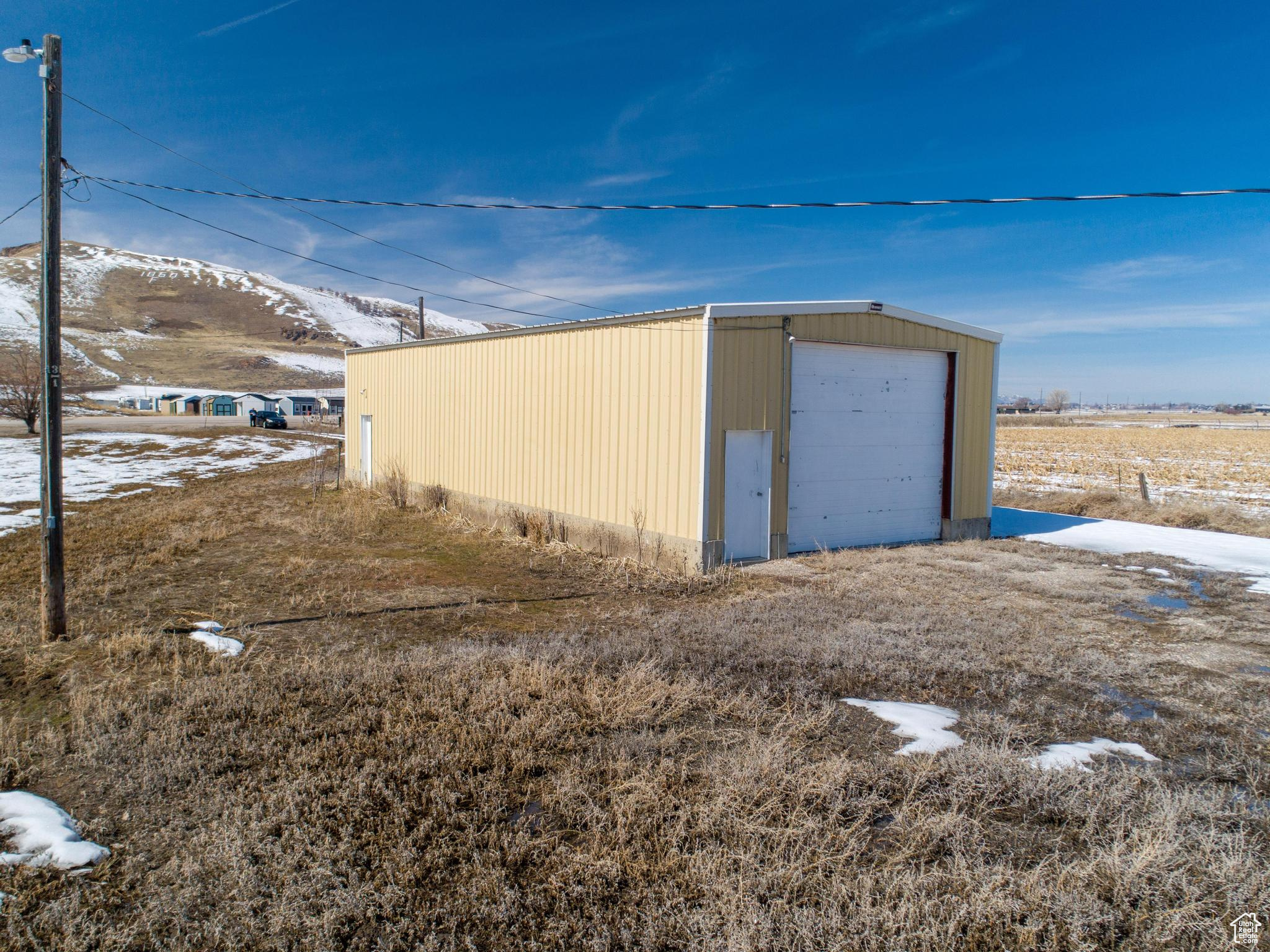 View of outbuilding with an outbuilding and a mountain view