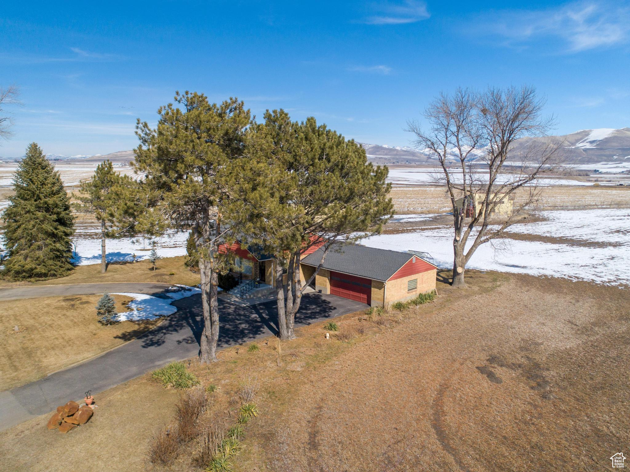 Birds eye view of property with a mountain view