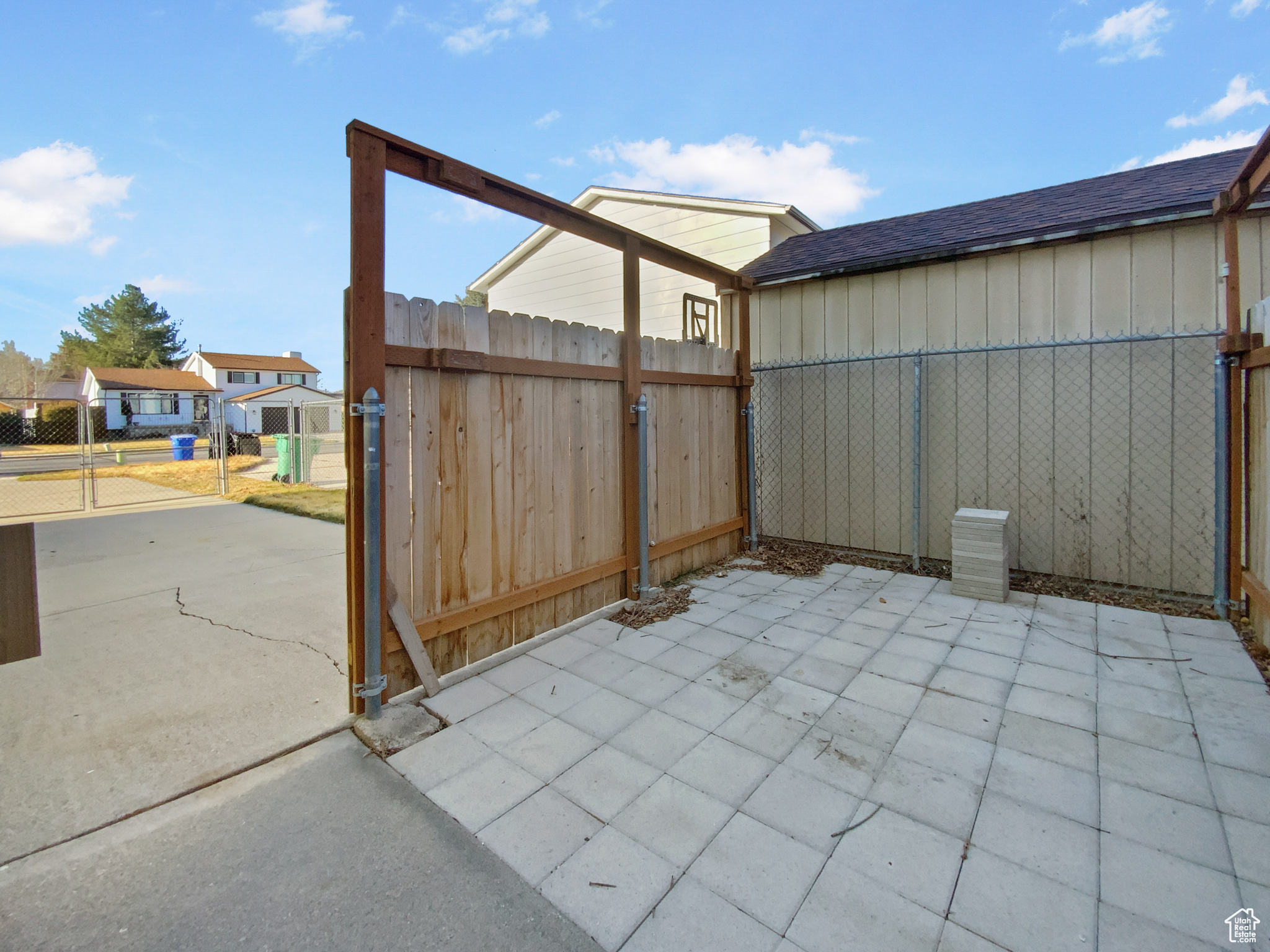 View of patio / terrace featuring a gate and fence