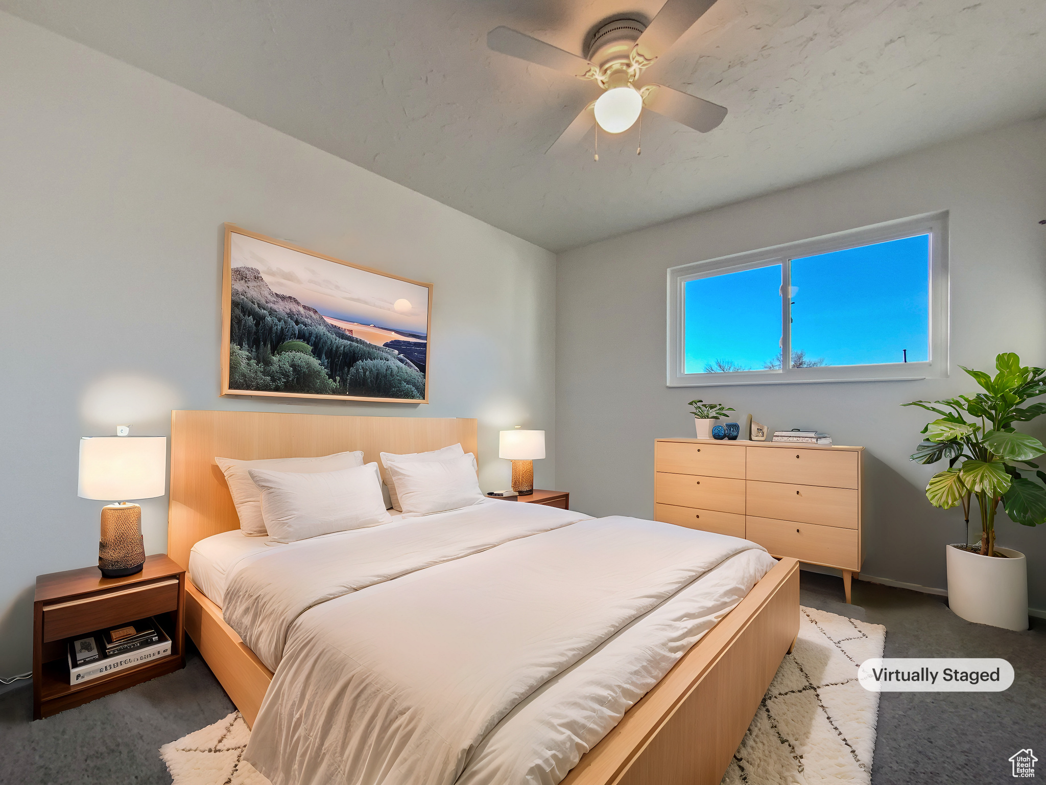 Bedroom with carpet flooring and ceiling fan
