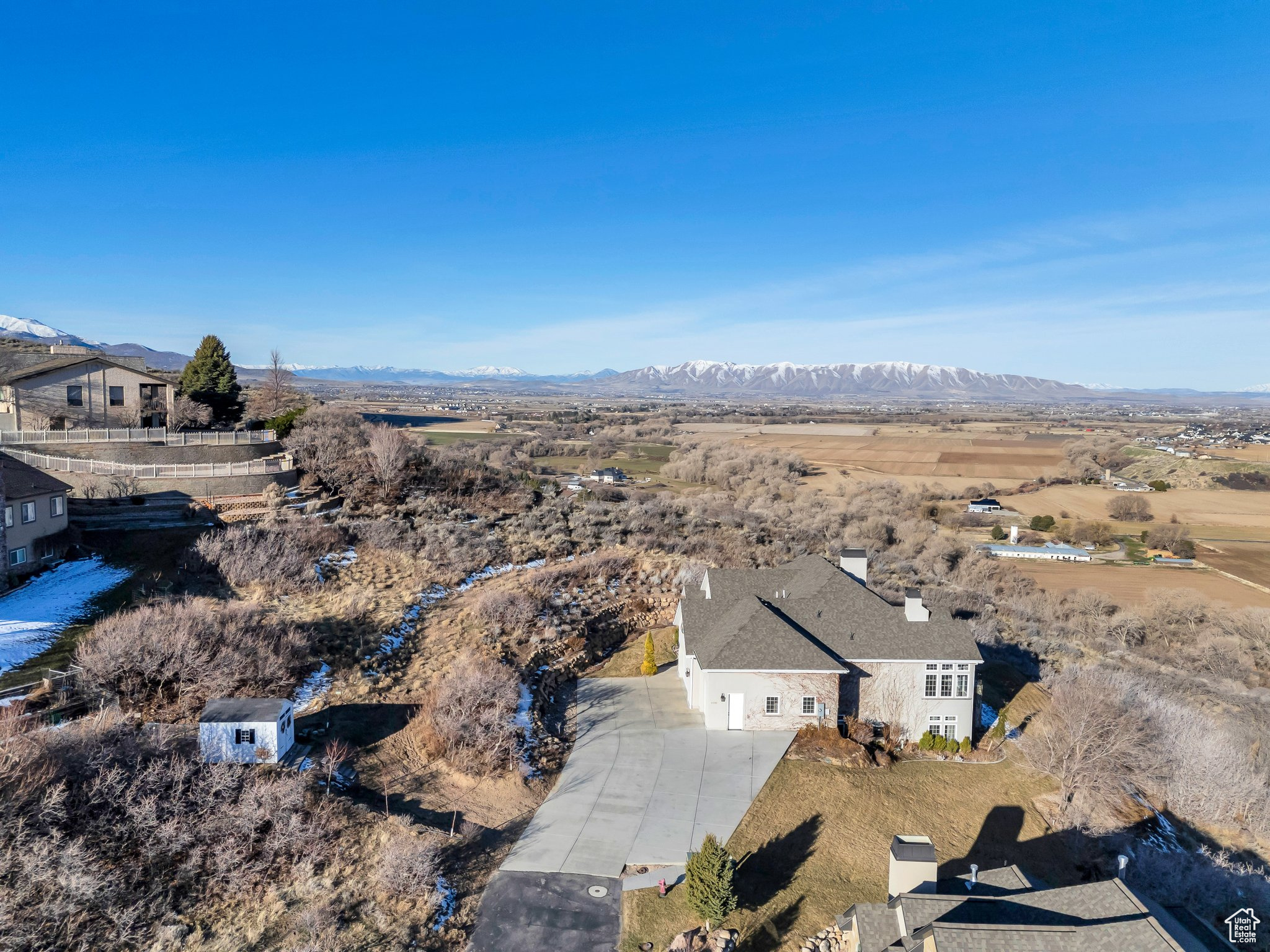 Birds eye view of property with a mountain view