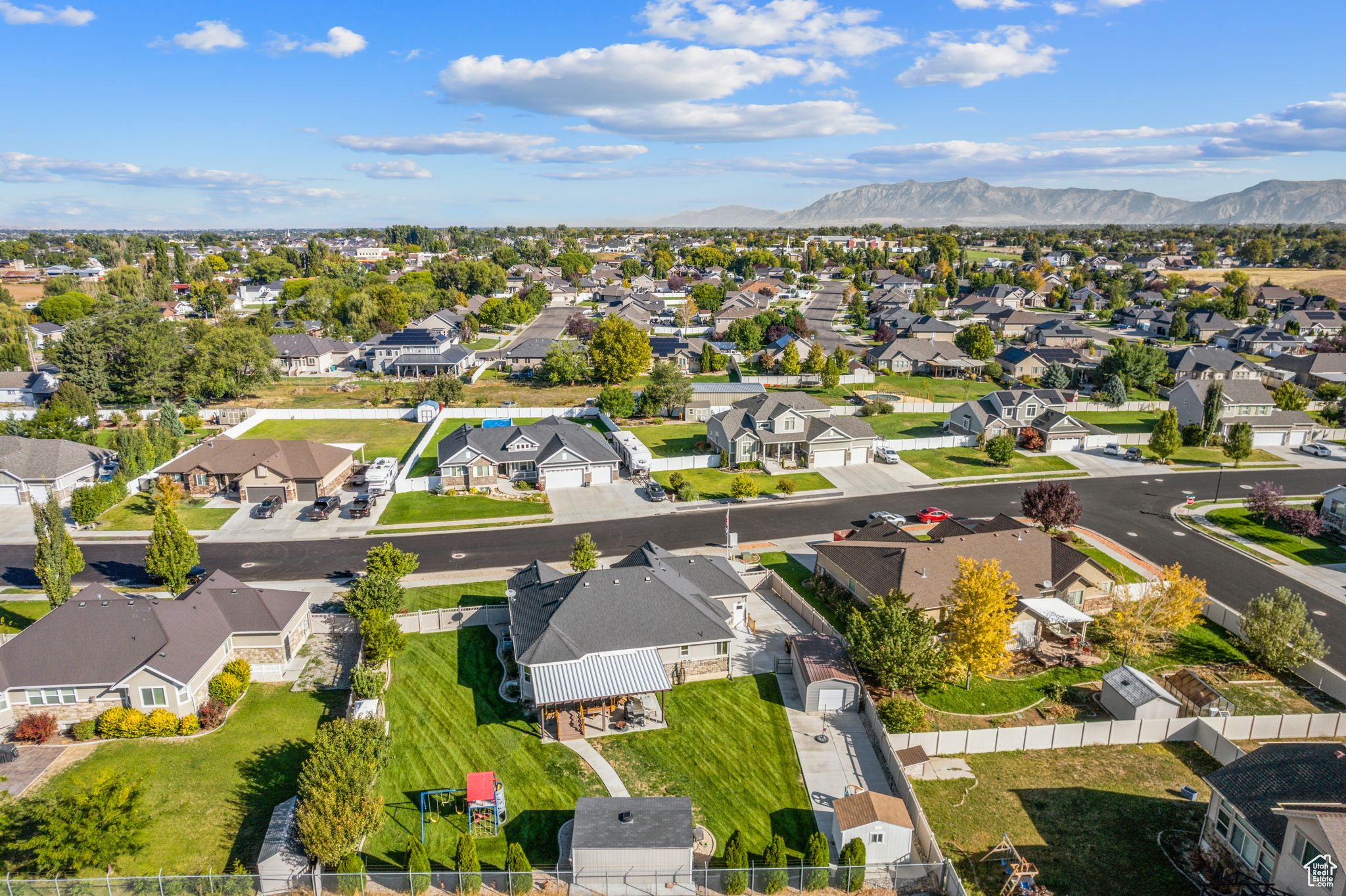 Drone / aerial view featuring a mountain view and a residential view