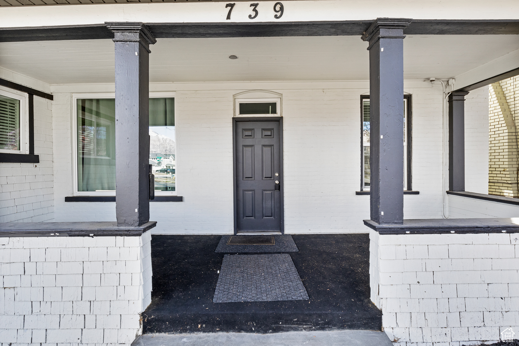 Property entrance with a porch