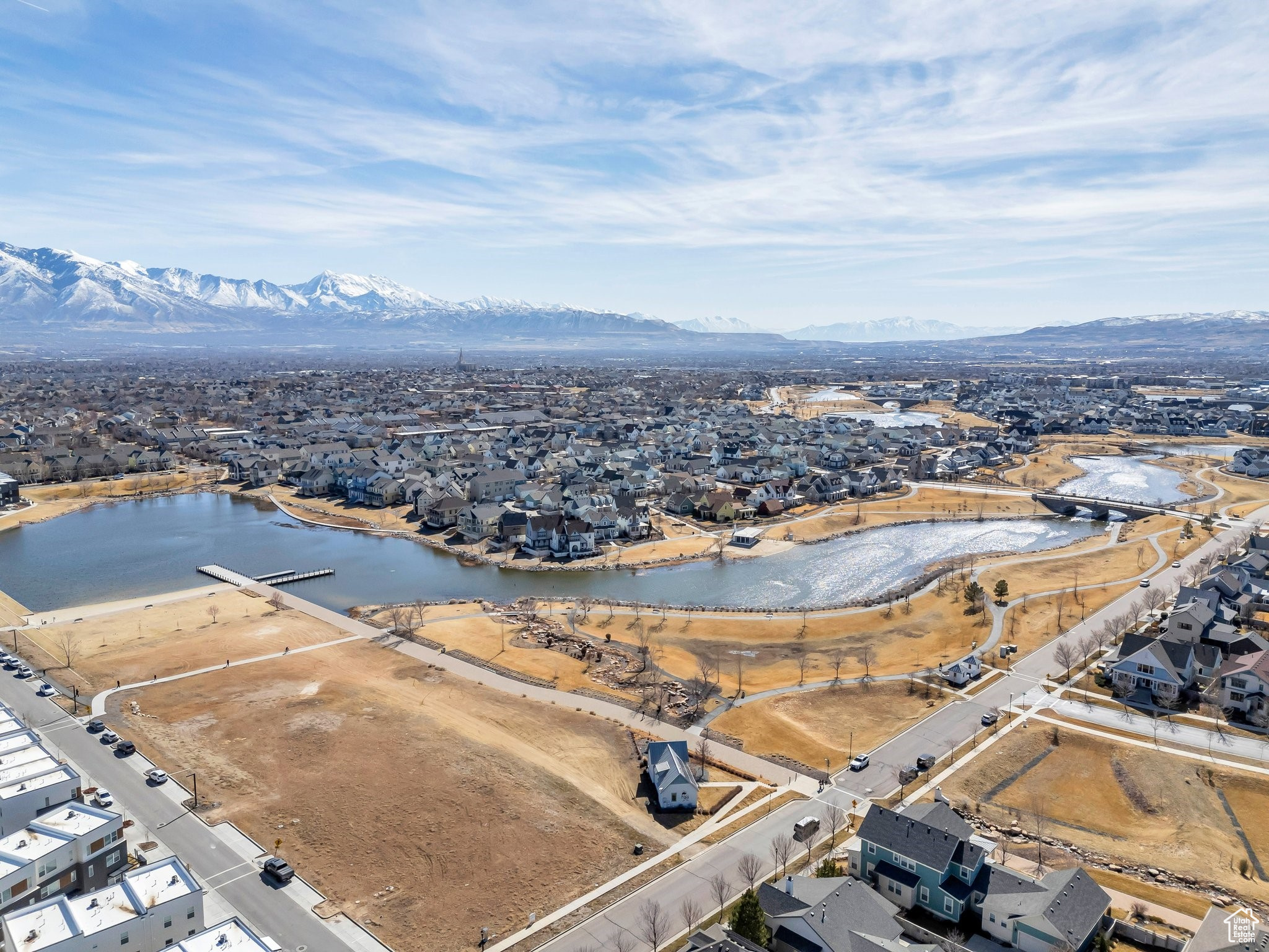 Drone / aerial view featuring a residential view and a water and mountain view
