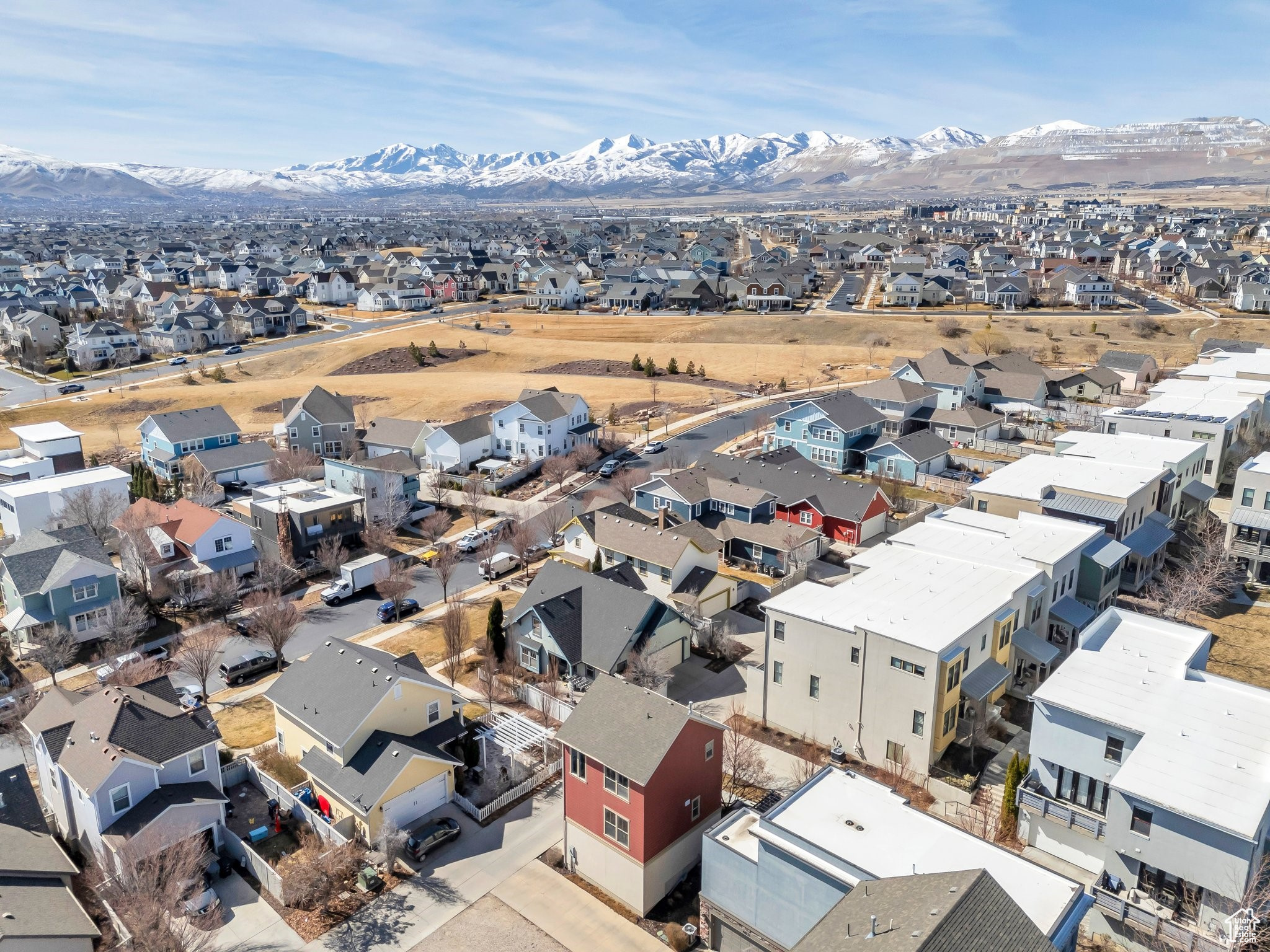 Drone / aerial view featuring a mountain view and a residential view