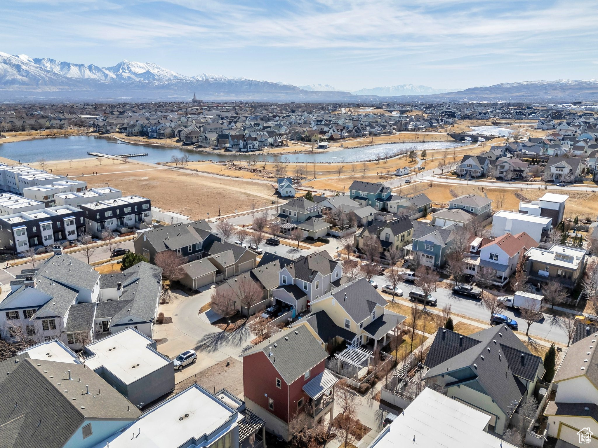 Drone / aerial view with a residential view and a water and mountain view