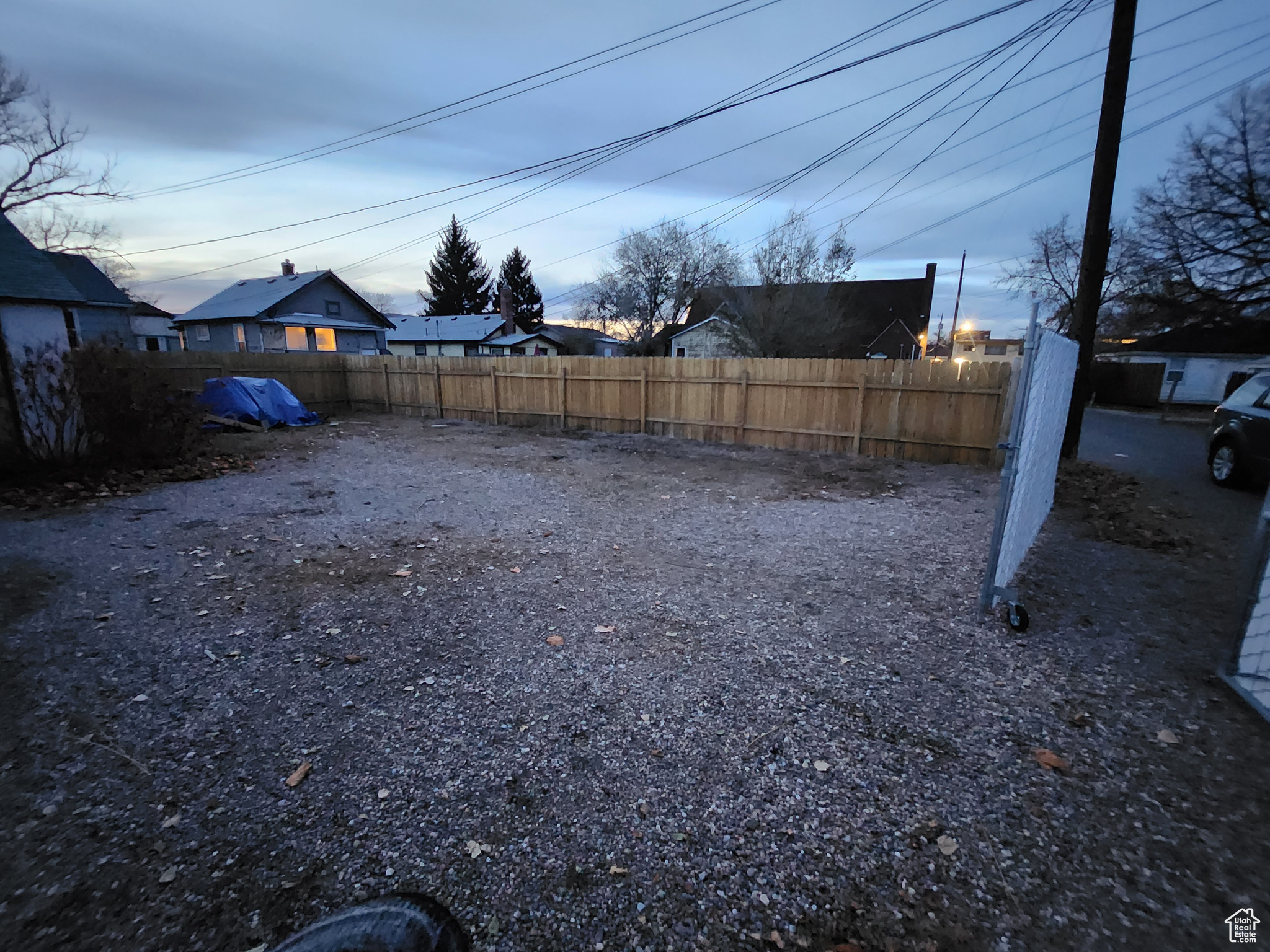 View of yard featuring fence